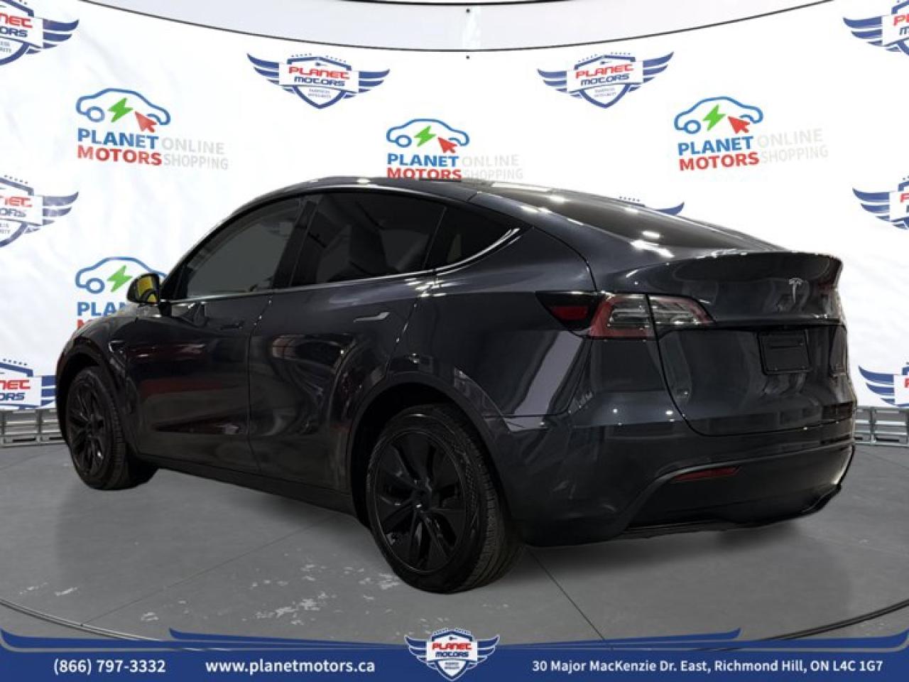 2025 Tesla Model Y Long Range AWD - Photo #7