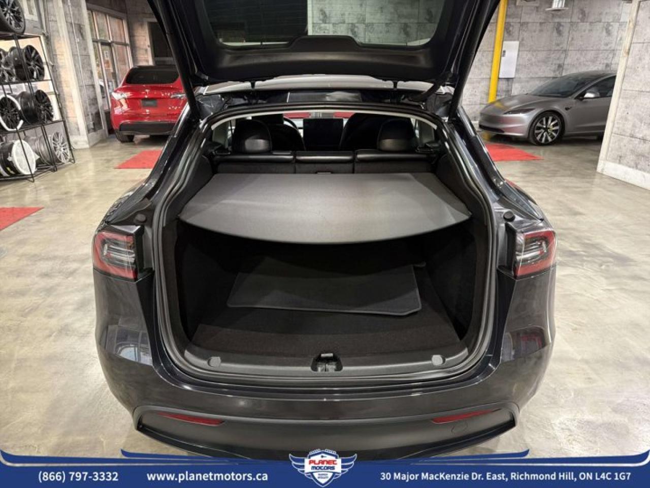 2025 Tesla Model Y Long Range AWD - Photo #11