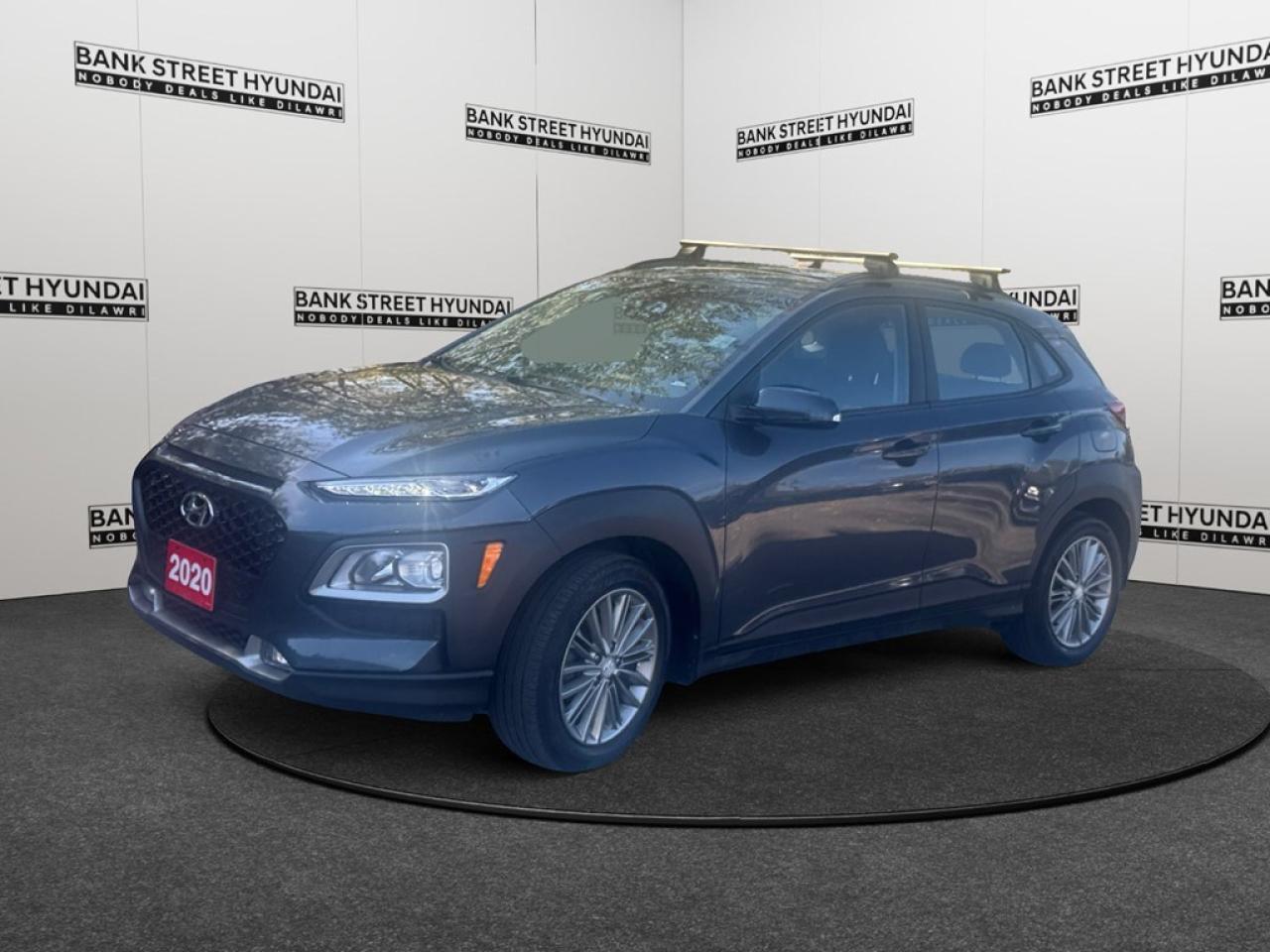 The 2020 Hyundai Kona 2.0L Preferred FWD in FWD drive offers a thrilling yet efficient driving experience. This SUV stands out with its captivating design, characterized by its striking silhouette and dynamic handling. Its elegant exterior is matched with alloy wheels and sleek lines, exuding both style and functionality. Inside, the Kona welcomes you with a spacious, well-appointed cabin featuring refined touches like a leather steering wheel, leather/metal-look gear shifter material, and power windows. Comfort is paramount, with heated seats and a heated steering wheel to keep you warm on chilly days. The bold design ensures you travel in style, as features like heated mirrors and keyless entry make every journey convenient. Technology is at the forefront in the Kona, featuring smart device integration and a user-friendly backup camera, to enhance both safety and entertainment on the road. The Bluetooth connection ensures seamless connectivity, while lane assist and brake assist work together to offer peace of mind with every drive. Standard heated front seats add an extra layer of comfort to your driving experience. Perfect for those seeking a reliable yet stylish SUV, the 2020 Hyundai Kona enjoys a unique blend of efficiency, style, and advanced technology. Ideal for young professionals or families looking to enjoy their journey, this SUV fits perfectly into an active lifestyle. Contact our dealership today for more information and let us help you make this Kona part of your daily adventures.