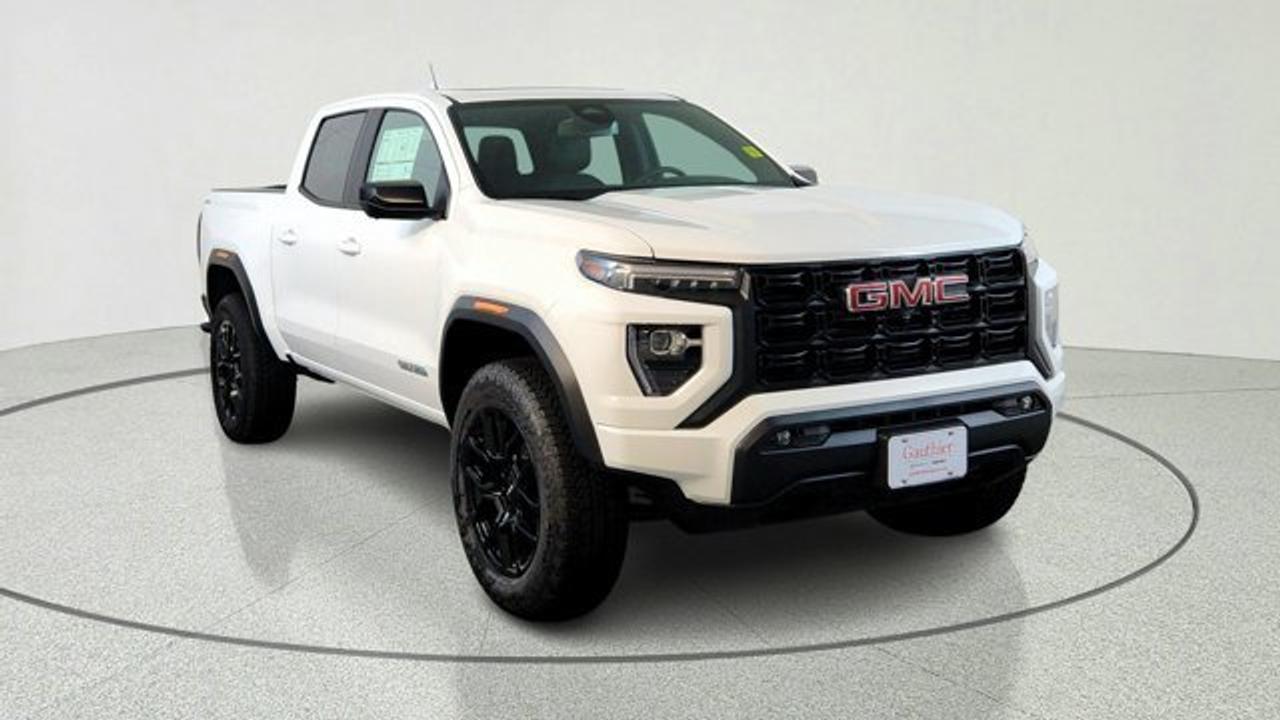 The 2026 GMC Canyon Elevation delivers a strong balance of comfort, tech, and utility in the midsize truck segment. The Convenience Package brings features such as dual-zone automatic climate control, remote start, LED fog lamps, a MultiStow tailgate, 120-volt outlets both bed-mounted and in the rear of the console, auto-dimming rearview mirror, keyed tailgate lock, and sliding visors with illuminated vanity mirrors. Meanwhile, the Technology Package adds advanced driver aids like Adaptive Cruise Control, HD Surround Vision, and Rear Pedestrian Alert. The sunroof enhances cabin ambiance with express-open/close functionality and adds natural light.