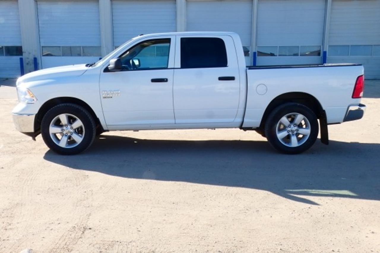 2023 Dodge Ram 1500 SLT Classic 4x4 Crew Cab w/Power cloth, BUC - Photo #1