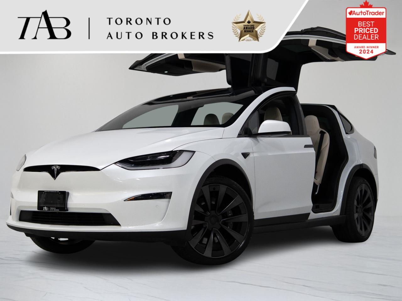 This 2022 Tesla Model X is a local Ontario vehicle with warranty until July 21, 2026. Finished in White, this six-passenger electric SUV offers exhilarating all-electric performance with 670 horsepower and dual-motor all-wheel drive. The cabin blends cutting-edge innovation with premium comfort, featuring the unique Yoke steering wheel, 22" Aluminum Alloy Wheels, and a panoramic glass roof. With advanced Autopilot features, an expansive touchscreen display, and seating for six, it redefines modern luxury and performance.

Key Features Include
22" Aluminum Alloy Wheels
Yoke Steering Wheel
Six-Passenger Seating Configuration
Dual-Motor All-Wheel Drive
Panoramic Glass Roof
Adaptive Air Suspension
Heated Front and Rear Seats
Heated Steering Wheel
Premium Audio with 22 Speakers
360-Degree Camera System

NOW OFFERING 3 MONTH DEFERRED FINANCING PAYMENTS ON APPROVED CREDIT. 

WE OFFER THE BEST FINANCE RATES, AND DONT CHARGE ANY FINANCING FEE 

Looking for a top-rated pre-owned luxury car dealership in the GTA? Look no further than Toronto Auto Brokers (TAB)! Were proud to have won multiple awards, including the 2024 AutoTrader Best Priced Dealer, the 2024 CarGurus Award, the 2025 Top Choice Award, the 2025 Consumer Satisfaction Award, the 2025 Canadian Choice Award, the 2025 Three Best Rated Dealer Award, and many more!

With 30 years of experience serving the Greater Toronto Area, TAB is a respected and trusted name in the pre-owned luxury car industry. Our 30,000 sq.Ft indoor showroom is home to a wide range of luxury vehicles from top brands like BMW, Mercedes-Benz, Audi, Porsche, Land Rover, Jaguar, Aston Martin, Bentley, Maserati, and more. And we dont just serve the GTA, were proud to offer our services to all cities in Canada, including Vancouver, Montreal, Calgary, Edmonton, Winnipeg, Saskatchewan, Halifax, and more.

At TAB, were committed to providing a no-pressure environment and honest work ethics. As a family-owned and operated business, we treat every customer like family and ensure that every interaction is a positive one. Come experience the TAB Lifestyle at its truest form, luxury car buying has never been more enjoyable and exciting!

We offer a variety of services to make your purchase experience as easy and stress-free as possible. From competitive and simple financing and leasing options to extended warranties, aftermarket services, and full history reports on every vehicle, we have everything you need to make an informed decision. We welcome every trade, even if youre just looking to sell your car without buying, and when it comes to financing or leasing, we offer same day approvals, with access to over 50 lenders, including all of the banks in Canada. Feel free to check out your own Equifax credit score without affecting your credit score, simply click on the Equifax tab above and see if you qualify.

So if youre looking for a luxury pre-owned car dealership in Toronto, look no further than TAB! We proudly serve the GTA, including Toronto, Etobicoke, Woodbridge, North York, York Region, Vaughan, Thornhill, Richmond Hill, Mississauga, Scarborough, Markham, Oshawa, Peteborough, Hamilton, Newmarket, Orangeville, Aurora, Brantford, Barrie, Kitchener, Niagara Falls, Oakville, Cambridge, Kitchener, Waterloo, Guelph, London, Windsor, Orillia, Pickering, Ajax, Whitby, Durham, Cobourg, Belleville, Kingston, Ottawa, Montreal, Vancouver, Winnipeg, Calgary, Edmonton, Regina, Halifax, and more.

Call us today or visit our website to learn more about our inventory and services. And remember, all prices exclude applicable taxes and licensing, and vehicles can be certified at an additional cost of $999.