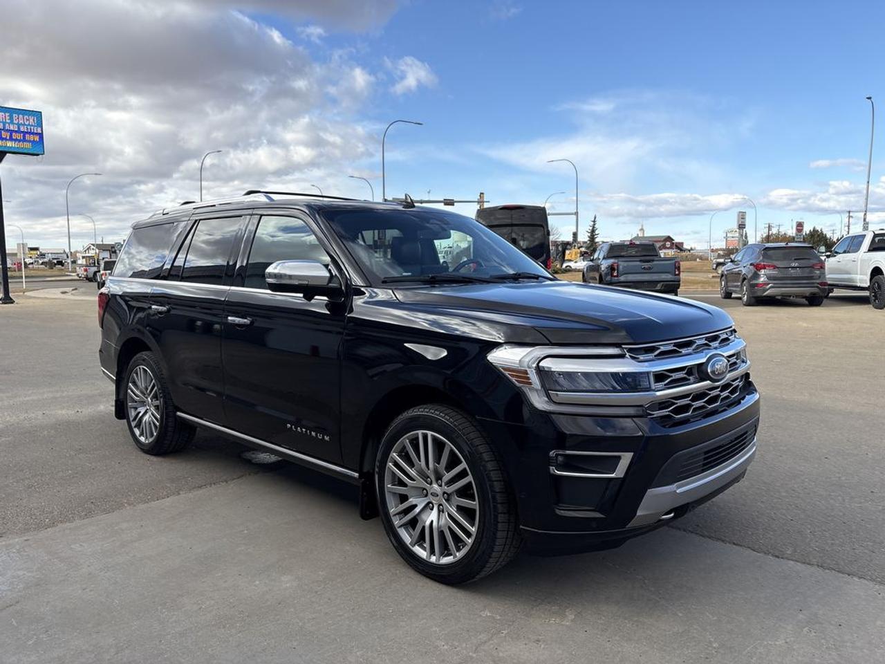 THE PRICE YOU SEE, PLUS GST. GUARANTEED!APPLE CARPLAY/ANDROID AUTO COMPATABLE! 3.5 LITER ECOBOOST, 10 SPEED AUTO, PLATINUM TRIM(600a), HEATED/VENTED FRONT SEATS, HEAVY DUTY TRAILER TOW PKG, 2ND ROW BENCH, PANORAMIC VISTA ROOF, HEATED STEERING.    The 2022 Ford Expedition equipped with the 3.5-liter EcoBoost V6 engine and the 600A Equipment Group offers a combination of impressive power, advanced technology, and luxurious comfort. The 3.5L EcoBoost engine generates around 400 horsepower and 480 lb-ft of torque, providing strong towing capacity and smooth acceleration, making it ideal for family trips and hauling heavy loads. The 600A package is a high-level trim that includes a host of premium features such as a large, intuitive SYNC 4 infotainment system with an 8- or 12-inch touchscreen, navigation, and wireless smartphone connectivity, along with a premium audio system for an enhanced in-cabin experience. It also adds luxurious touches like leather-trimmed seats, heated and ventilated front seats, a power-folding third-row, and advanced driver-assist features such as adaptive cruise control, blind-spot monitoring, and a 360-degree camera system. The Expedition with this package emphasizes both capability and comfort, providing a spacious interior with upscale amenities, making it an excellent choice for families seeking a powerful, tech-savvy, and refined full-size SUV.Do you want to know more about this vehicle, CALL, CLICK OR COME ON IN!*AMVIC Licensed Dealer; CarFax and Full Mechanical Inspection Included.