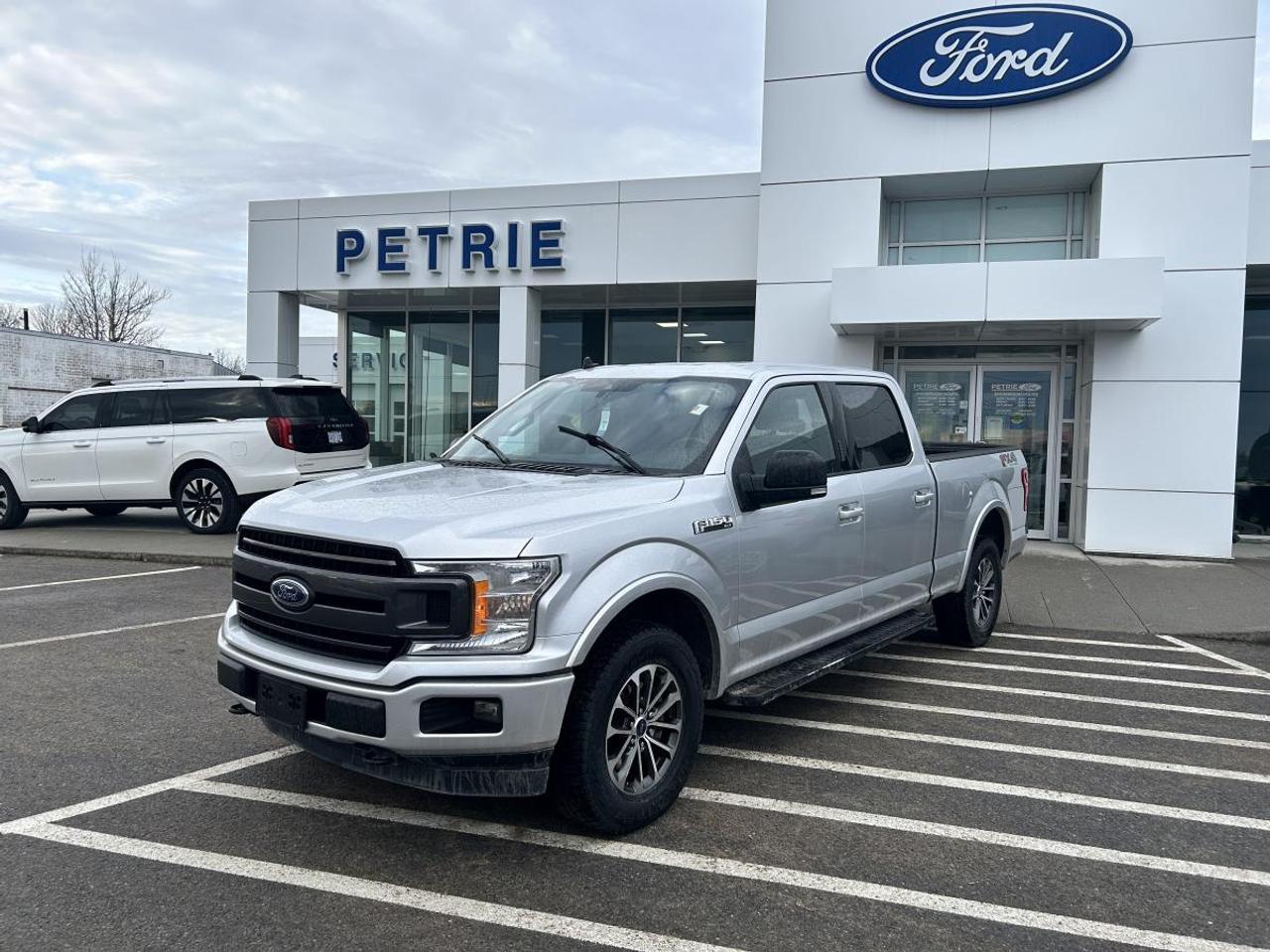 Built Ford tough! Here is a 2019 Ford F-150 XLT. Powered by a 5.0L V8 engine with an electronic 10-speed automatic transmission that delivers legendary performance and towing capability. The 2019 Ford F-150 XLT is a powerful pickup truck designed to tackle every job. Everything you expect from a truck and more, check out the 2019 Ford F-150 XLT today! Key Features: >> Equipment group 302A >> LT tire capability package >> Trailer tow package >> XLT sport package >> Remote start system >> Power sliding rear window >> Heavy duty shocks >> Cruise control >> Engine block heater >> Rear view camera >> Reverse sensing system >> 110V/400W outlet >> Pickup box tie down hooks >> LED box lighting >> Selectshift automatic transmission >> FORDPASS CONNECT and so much more! This 2019 Ford F-150 XLT is available now at Petrie Ford. We are located at 1388 Bath Road in Kingston, Ontario. Come schedule a test drive today!<p>Built Ford tough! Here is a 2019 Ford F-150 XLT. Powered by a 5.0L V8 engine with an electronic 10-speed automatic transmission that delivers legendary performance and towing capability. The 2019 Ford F-150 XLT is a powerful pickup truck designed to tackle every job. Everything you expect from a truck and more</p>
<p> check out the 2019 Ford F-150 XLT today! Key Features: >> Equipment group 302A >> LT tire capability package >> Trailer tow package >> XLT sport package >> Remote start system >> Power sliding rear window >> Heavy duty shocks >> Cruise control >> Engine block heater >> Rear view camera >> Reverse sensing system >> 110V/400W outlet >> Pickup box tie down hooks >> LED box lighting >> Selectshift automatic transmission >> FORDPASS CONNECT and so much more! This 2019 Ford F-150 XLT is available now at Petrie Ford. We are located at 1388 Bath Road in Kingston</p>