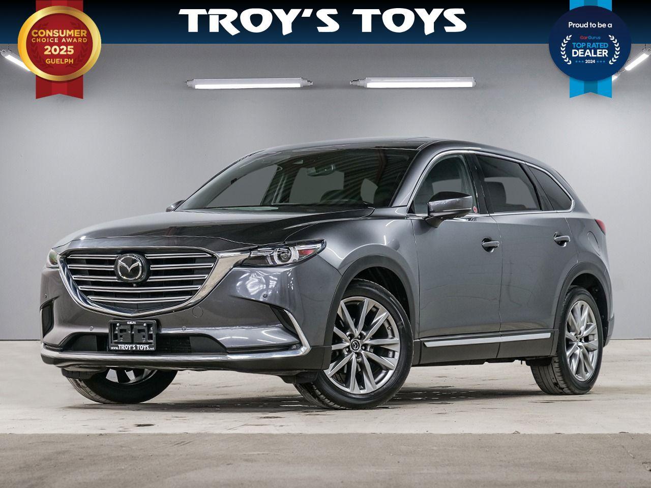<p>Looking for a stylish and capable SUV thats ready for anything? Check out this stunning 2019 Mazda CX-9 GT, available now at Troys Toys! This sleek, gray beauty boasts a luxurious black interior, offering a sophisticated and comfortable driving experience for you and your passengers. With its powerful and efficient 2.5L I4 engine, paired with a smooth-shifting automatic transmission and all-wheel drive, this CX-9 GT is prepared to tackle any road conditions Canada throws your way. This family-friendly SUV offers plenty of space for both passengers and cargo. Plus, with only 100,629 km on the odometer, this Mazda has plenty of life left.</p><p>This Mazda CX-9 GT is packed with features designed to enhance your driving pleasure. Here are five of its most exciting highlights:</p><ul><li><strong>All-Wheel Drive:</strong> Conquer winter roads and enjoy confident handling year-round.</li><li><strong>Luxurious Interior:</strong> Sink into the comfort of premium black leather seats.</li><li><strong>Automatic Transmission:</strong> Effortless driving with seamless gear changes.</li><li><strong>Spacious SUV Design:</strong> Generous cabin and cargo space to accommodate your lifestyle.</li><li><strong>Stylish Exterior:</strong> Make a statement wherever you go with its modern and eye-catching design.</li></ul><p>Visit Troys Toys today to experience the Mazda CX-9 GT for yourself!</p><p><strong><em>Powered by AutoIntelligence&trade;</em></strong> Vehicle information has been generated using artificial intelligence and is provided for informational purposes only. While efforts are made to ensure accuracy, please confirm all details directly with the dealer.</p>