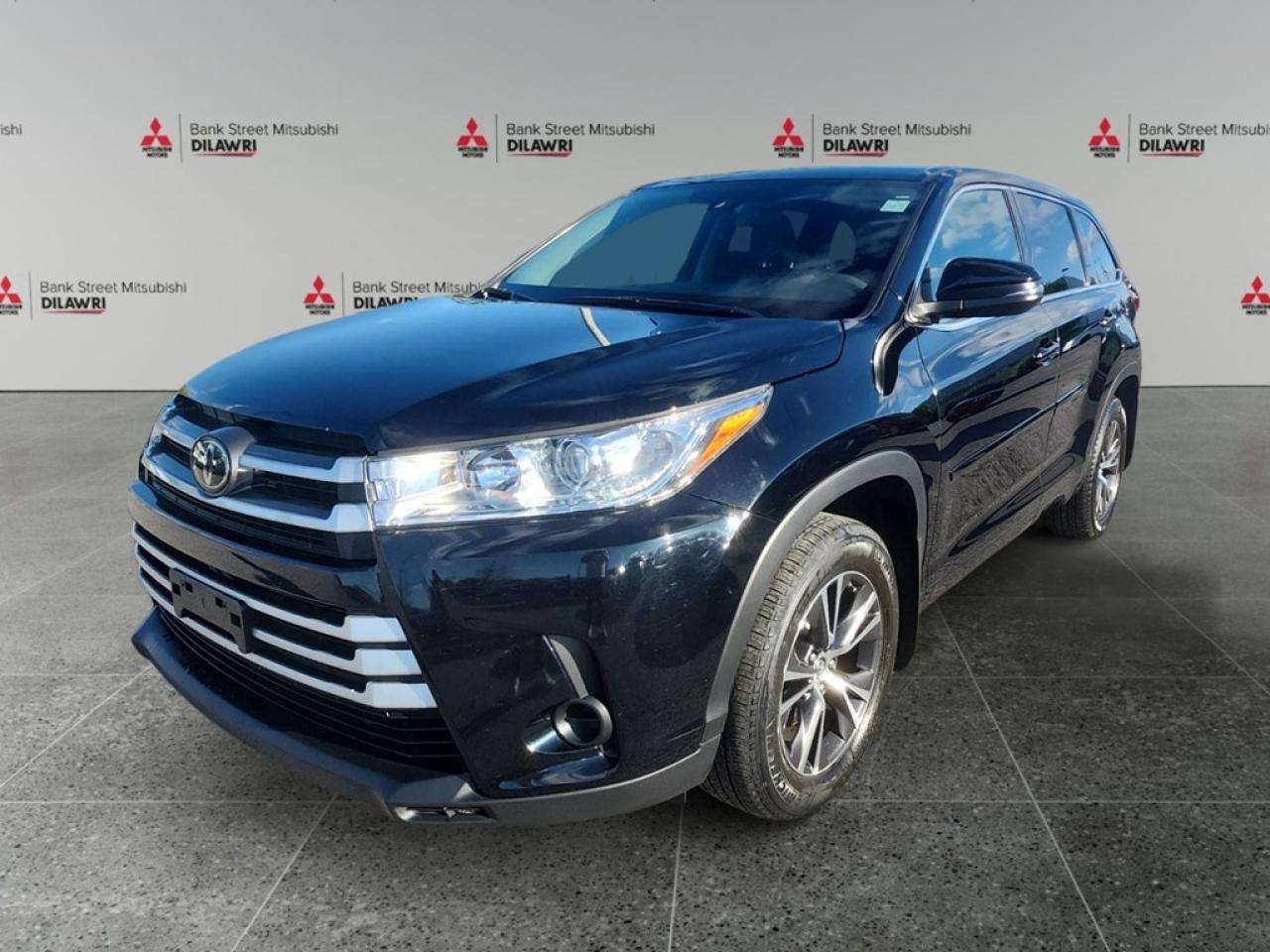 Balance of 5 year/100,000kms BASIC warranty and 10 year/160,000kms Factory Powertrain Warranty on ALL MITSUBISHI products! Best in the industry!!!! The 2018 Toyota Highlander LE in striking black with all-wheel drive is engineered for the ultimate in road handling and stability. This SUV is the epitome of power and style, driven by a robust 3.5L 6-cylinder engine that offers impressive performance. The Highlanders exterior is complemented by stylish alloy wheels, while its interior welcomes you with features designed for both comfort and convenience. Enjoy the practicality of power windows and the ease of keyless entry, combined with the comfort of air conditioning for every journey. Equipped with modern technology, this Highlander includes a user-friendly backup camera and a seamless Bluetooth connection to keep you connected on-the-go. Safety is paramount, featuring adaptive cruise control, brake assist, and lane assist, providing added assurance and peace of mind for every drive. Heated mirrors enhance your visibility in cooler climates. This vehicle is perfect for families and adventurers alike, offering spaciousness and reliability. Those seeking a dependable SUV with a touch of luxury are encouraged to contact our dealership for more details and to arrange a test drive.