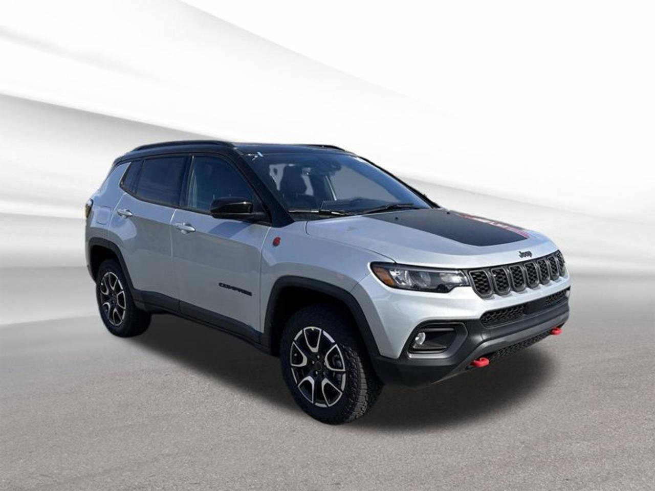 Introducing the brand new 2026 Jeep Compass Trailhawk, now available at Steele Halifax Chrysler Dodge Jeep Ram FIAT. This SUV stands out with its modern silver exterior and sleek black interior, offering a bold look and a comfortable ride for Halifax drivers. With four doors, automatic transmission, and advanced four-wheel drive, its ready for any adventure--urban or off-road. The robust Intercooled Turbo Regular Unleaded I-4 2.0 L engine delivers reliable power and efficiency for daily commutes or weekend getaways.ADVANCED SAFETY FEATURESBackup camera enhances parking and reversing confidenceAdvanced airbag system for comprehensive occupant protectionElectronic stability control for improved handlingTire pressure monitoring system for added peace of mindPERFORMANCE AND EFFICIENCY2.0 L turbocharged engine balances power and economyFour-wheel drive for superior traction in all seasonsAutomatic transmission for smooth gear changesEngineered for responsive handling on various terrainsCOMFORT AND CONVENIENCESpacious cabin with seating for five passengersAutomatic climate control for year-round comfortAmple legroom in both front and rear seatsEasy entry and exit with four-door accessTECHNOLOGY AND CONNECTIVITYIntegrated infotainment system for seamless media accessBluetooth connectivity for hands-free communicationUSB ports for convenient device chargingDigital instrument cluster for clear driving informationCARGO SPACEFlexible rear seats expand cargo capacityFlat load floor for easy storage of large itemsMultiple storage compartments for smaller belongingsSufficient space for groceries, gear, or luggageWHAT OTHER OWNERS LIKEConfident four-wheel drive performance in Canadian wintersUser-friendly infotainment and connectivity optionsComfortable ride quality on city streets and highwaysVersatile cargo space for daily and weekend needs