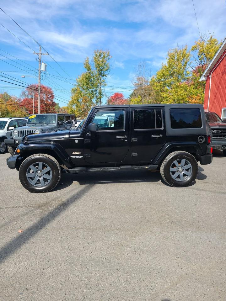 2013 Jeep Wrangler Sahara - Photo #2
