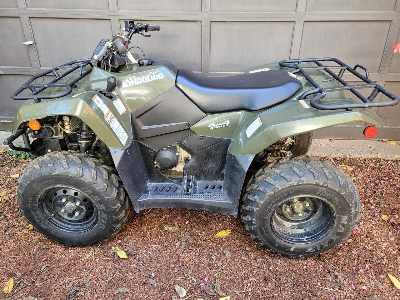 <p>Terra Green</p><p>WARN 3000lb Winch</p><p>One Owner, Financing Available & Trade-ins Welcome!</p><p><span style=color: #001d35; font-family: Google Sans, Arial, sans-serif;><span style=background-color: #ffffff;>The 2015 Suzuki KingQuad 400ASi is a 376cc, fuel-injected, air-cooled utility ATV known for its reliability, utility, and midsize format, featuring an automatic QuadMatic CVT transmission with high/low range, selectable 2WD/4WD, and a torque-sensing front differential. It excels at farm and ranch work with a 992 lb towing capacity and features independent front suspension for comfort and a solid rear axle, making it a durable workhorse rather than a high-performance sport quad.&nbsp;</span></span></p><div class=WaaZC style=color: #001d35; font-family: Google Sans, Arial, sans-serif; font-size: 16px; background-color: #ffffff;><div class=RJPOee EIJn2 style=animation: auto ease 0s 1 normal none running none !important;><div class=rPeykc uP58nb style=margin: 20px 0px 10px; font-size: 20px; line-height: 28px; data-hveid=CBQQAQ data-ved=2ahUKEwjh7urD35eQAxVil4kEHfoTKC8Qo_EKegQIFBAB><span data-huuid=14075321718419873010>Key Features & Specifications</span></div></div></div><div class=WaaZC style=color: #001d35; font-family: Google Sans, Arial, sans-serif; font-size: 16px; background-color: #ffffff;><div class=RJPOee EIJn2 style=animation: auto ease 0s 1 normal none running none !important;><ul style=margin: 10px 0px 20px; padding: 0px; line-height: 24px; padding-inline-start: 24px; data-hveid=CEIQAQ data-ved=2ahUKEwjh7urD35eQAxVil4kEHfoTKC8Qm_YKegQIQhAB><li class=K3KsMc style=margin: 0px 0px 8px; padding: 0px 0px 0px 4px; list-style-position: inherit; list-style-image: inherit; list-style-type: none;><div class=zMgcWd dSKvsb style=padding-bottom: 0px; padding-top: 0px; border-bottom: none; margin-inline-start: -28px; data-il=><div data-crb-p=><div class=xFTqob style=flex: 1 1 0%; min-width: 0px;><div class=Gur8Ad style=line-height: 24px; overflow: hidden; padding-bottom: 4px; transition: transform 200ms cubic-bezier(0.2, 0, 0, 1); display: inline;><span data-huuid=14075321718419873625><strong>Engine:</strong>&nbsp;</span></div><div class=vM0jzc style=line-height: 24px; display: inline;><span data-huuid=14075321718419869734><span data-huuid=14075321718419869734>376cc, 4-stroke, single-cylinder, air-cooled engine with Suzuki Fuel Injection.<span class=pjBG2e data-cid=e6215364-8b91-4802-8b35-80a0d977fa79><span class=UV3uM style=text-wrap-mode: nowrap;>&nbsp;</span></span></span></span><div class=NPrrbc style=margin-inline-end: 6px; vertical-align: middle; display: inline-flex; data-cid=e6215364-8b91-4802-8b35-80a0d977fa79 data-uuids=14075321718419873625,14075321718419869734><div class=BMebGe btku5b LwdV0e FR7ZSc OJeuxf style=display: inline-flex !important; vertical-align: middle; cursor: pointer; outline: 0px; -webkit-tap-highlight-color: transparent; color: #0b57d0; tabindex=0 role=button aria-label=View related links data-hveid=CCcQAQ data-ved=2ahUKEwjh7urD35eQAxVil4kEHfoTKC8Q3fYKegQIJxAB><div class=niO4u style=display: flex; justify-content: center; position: relative; align-items: center; width: 28px; z-index: 0; border-radius: 9999px; -webkit-box-pack: center; -webkit-box-align: center; background: transparent; margin: 0px auto; height: 20px; outline: transparent solid 1px; outline-offset: -1px; min-height: 20px;>&nbsp;</div></div></div></div></div></div></div></li><li class=K3KsMc style=margin: 0px 0px 8px; padding: 0px 0px 0px 4px; list-style-position: inherit; list-style-image: inherit; list-style-type: none;><div class=zMgcWd dSKvsb style=padding-bottom: 0px; padding-top: 8px; border-bottom: none; margin-inline-start: -28px; data-il=><div data-crb-p=><div class=xFTqob style=flex: 1 1 0%; min-width: 0px;><div class=Gur8Ad style=line-height: 24px; overflow: hidden; padding-bottom: 4px; transition: transform 200ms cubic-bezier(0.2, 0, 0, 1); display: inline;><span data-huuid=14075321718419870144><strong>Transmission:</strong>&nbsp;</span></div><div class=vM0jzc style=line-height: 24px; display: inline;><span data-huuid=14075321718419870349><span data-huuid=14075321718419870349>Fully automatic QuadMatic CVT transmission with high/low range and reverse.<span class=pjBG2e data-cid=e43265ae-561f-4841-86a4-d7a87fc1d151><span class=UV3uM style=text-wrap-mode: nowrap;>&nbsp;</span></span></span></span><div class=NPrrbc style=margin-inline-end: 6px; vertical-align: middle; display: inline-flex; data-cid=e43265ae-561f-4841-86a4-d7a87fc1d151 data-uuids=14075321718419870144,14075321718419870349><div class=BMebGe btku5b LwdV0e FR7ZSc OJeuxf style=display: inline-flex !important; vertical-align: middle; cursor: pointer; outline: 0px; -webkit-tap-highlight-color: transparent; color: #0b57d0; tabindex=0 role=button aria-label=View related links data-hveid=CDQQAQ data-ved=2ahUKEwjh7urD35eQAxVil4kEHfoTKC8Q3fYKegQINBAB><div class=niO4u style=display: flex; justify-content: center; position: relative; align-items: center; width: 28px; z-index: 0; border-radius: 9999px; -webkit-box-pack: center; -webkit-box-align: center; background: transparent; margin: 0px auto; height: 20px; outline: transparent solid 1px; outline-offset: -1px; min-height: 20px;>&nbsp;</div></div></div></div></div></div></div></li><li class=K3KsMc style=margin: 0px 0px 8px; padding: 0px 0px 0px 4px; list-style-position: inherit; list-style-image: inherit; list-style-type: none;><div class=zMgcWd dSKvsb style=padding-bottom: 0px; padding-top: 8px; border-bottom: none; margin-inline-start: -28px; data-il=><div data-crb-p=><div class=xFTqob style=flex: 1 1 0%; min-width: 0px;><div class=Gur8Ad style=line-height: 24px; overflow: hidden; padding-bottom: 4px; transition: transform 200ms cubic-bezier(0.2, 0, 0, 1); display: inline;><span data-huuid=14075321718419870759><strong>Drive System:</strong>&nbsp;</span></div><div class=vM0jzc style=line-height: 24px; display: inline;><span data-huuid=14075321718419870964><span data-huuid=14075321718419870964>Selectable 2WD/4WD and a torque-sensing front differential for improved traction.<span class=pjBG2e data-cid=25922990-52aa-4447-be80-210f0276c797><span class=UV3uM style=text-wrap-mode: nowrap;>&nbsp;</span></span></span></span><div class=NPrrbc style=margin-inline-end: 6px; vertical-align: middle; display: inline-flex; data-cid=25922990-52aa-4447-be80-210f0276c797 data-uuids=14075321718419870759,14075321718419870964><div class=BMebGe btku5b LwdV0e FR7ZSc OJeuxf style=display: inline-flex !important; vertical-align: middle; cursor: pointer; outline: 0px; -webkit-tap-highlight-color: transparent; color: #0b57d0; tabindex=0 role=button aria-label=View related links data-hveid=CDIQAQ data-ved=2ahUKEwjh7urD35eQAxVil4kEHfoTKC8Q3fYKegQIMhAB><div class=niO4u style=display: flex; justify-content: center; position: relative; align-items: center; width: 28px; z-index: 0; border-radius: 9999px; -webkit-box-pack: center; -webkit-box-align: center; background: transparent; margin: 0px auto; height: 20px; outline: transparent solid 1px; outline-offset: -1px; min-height: 20px;>&nbsp;</div></div></div></div></div></div></div></li><li class=K3KsMc style=margin: 0px 0px 8px; padding: 0px 0px 0px 4px; list-style-position: inherit; list-style-image: inherit; list-style-type: none;><div class=zMgcWd dSKvsb style=padding-bottom: 0px; padding-top: 8px; border-bottom: none; margin-inline-start: -28px; data-il=><div data-crb-p=><div class=xFTqob style=flex: 1 1 0%; min-width: 0px;><div class=Gur8Ad style=line-height: 24px; overflow: hidden; padding-bottom: 4px; transition: transform 200ms cubic-bezier(0.2, 0, 0, 1); display: inline;><span data-huuid=14075321718419871374><strong>Suspension:</strong>&nbsp;</span></div><div class=vM0jzc style=line-height: 24px; display: inline;><span data-huuid=14075321718419871579><span data-huuid=14075321718419871579>Independent double-wishbone front suspension and a swingarm-type solid rear axle.<span class=pjBG2e data-cid=efb15f3c-8b22-49a0-84b4-fb98db96c0b2><span class=UV3uM style=text-wrap-mode: nowrap;>&nbsp;</span></span></span></span><div class=NPrrbc style=margin-inline-end: 6px; vertical-align: middle; display: inline-flex; data-cid=efb15f3c-8b22-49a0-84b4-fb98db96c0b2 data-uuids=14075321718419871374,14075321718419871579><div class=BMebGe btku5b LwdV0e FR7ZSc OJeuxf style=display: inline-flex !important; vertical-align: middle; cursor: pointer; outline: 0px; -webkit-tap-highlight-color: transparent; color: #0b57d0; tabindex=0 role=button aria-label=View related links data-hveid=CDkQAQ data-ved=2ahUKEwjh7urD35eQAxVil4kEHfoTKC8Q3fYKegQIORAB><div class=niO4u style=display: flex; justify-content: center; position: relative; align-items: center; width: 28px; z-index: 0; border-radius: 9999px; -webkit-box-pack: center; -webkit-box-align: center; background: transparent; margin: 0px auto; height: 20px; outline: transparent solid 1px; outline-offset: -1px; min-height: 20px;>&nbsp;</div></div></div></div></div></div></div></li><li class=K3KsMc style=margin: 0px 0px 8px; padding: 0px 0px 0px 4px; list-style-position: inherit; list-style-image: inherit; list-style-type: none;><div class=zMgcWd dSKvsb style=padding-bottom: 0px; padding-top: 8px; border-bottom: none; margin-inline-start: -28px; data-il=><div data-crb-p=><div class=xFTqob style=flex: 1 1 0%; min-width: 0px;><div class=Gur8Ad style=line-height: 24px; overflow: hidden; padding-bottom: 4px; transition: transform 200ms cubic-bezier(0.2, 0, 0, 1); display: inline;><span data-huuid=14075321718419871989><strong>Braking:</strong>&nbsp;</span></div><div class=vM0jzc style=line-height: 24px; display: inline;><span data-huuid=14075321718419872194><span data-huuid=14075321718419872194>Dual front disc brakes and a rear drum brake.<span class=pjBG2e data-cid=4a35bdd6-04ef-40f3-8a96-b67600818b67><span class=UV3uM style=text-wrap-mode: nowrap;>&nbsp;</span></span></span></span><div class=NPrrbc style=margin-inline-end: 6px; vertical-align: middle; display: inline-flex; data-cid=4a35bdd6-04ef-40f3-8a96-b67600818b67 data-uuids=14075321718419871989,14075321718419872194><div class=BMebGe btku5b LwdV0e FR7ZSc OJeuxf style=display: inline-flex !important; vertical-align: middle; cursor: pointer; outline: 0px; -webkit-tap-highlight-color: transparent; color: #0b57d0; tabindex=0 role=button aria-label=View related links data-hveid=CC4QAQ data-ved=2ahUKEwjh7urD35eQAxVil4kEHfoTKC8Q3fYKegQILhAB><div class=niO4u style=display: flex; justify-content: center; position: relative; align-items: center; width: 28px; z-index: 0; border-radius: 9999px; -webkit-box-pack: center; -webkit-box-align: center; background: transparent; margin: 0px auto; height: 20px; outline: transparent solid 1px; outline-offset: -1px; min-height: 20px;>&nbsp;</div></div></div></div></div></div></div></li><li class=K3KsMc style=margin: 0px 0px 8px; padding: 0px 0px 0px 4px; list-style-position: inherit; list-style-image: inherit; list-style-type: none;><div class=zMgcWd dSKvsb style=padding-bottom: 0px; padding-top: 8px; border-bottom: none; margin-inline-start: -28px; data-il=><div data-crb-p=><div class=xFTqob style=flex: 1 1 0%; min-width: 0px;><div class=Gur8Ad style=line-height: 24px; overflow: hidden; padding-bottom: 4px; transition: transform 200ms cubic-bezier(0.2, 0, 0, 1); display: inline;><span data-huuid=14075321718419872604><strong>Towing & Racks:</strong>&nbsp;</span></div><div class=vM0jzc style=line-height: 24px; display: inline;><span data-huuid=14075321718419872809><span data-huuid=14075321718419872809>Towing capacity of 992 lbs, with 66 lbs of capacity on the front rack and 132 lbs on the rear rack.<span class=pjBG2e data-cid=b1efe099-6796-4447-b24e-fe2a35147ca2><span class=UV3uM style=text-wrap-mode: nowrap;>&nbsp;</span></span></span></span><div class=NPrrbc style=margin-inline-end: 6px; vertical-align: middle; display: inline-flex; data-cid=b1efe099-6796-4447-b24e-fe2a35147ca2 data-uuids=14075321718419872604,14075321718419872809><div class=BMebGe btku5b LwdV0e FR7ZSc OJeuxf style=display: inline-flex !important; vertical-align: middle; cursor: pointer; outline: 0px; -webkit-tap-highlight-color: transparent; color: #0b57d0; tabindex=0 role=button aria-label=View related links data-hveid=CDsQAQ data-ved=2ahUKEwjh7urD35eQAxVil4kEHfoTKC8Q3fYKegQIOxAB><div class=niO4u style=display: flex; justify-content: center; position: relative; align-items: center; width: 28px; z-index: 0; border-radius: 9999px; -webkit-box-pack: center; -webkit-box-align: center; background: transparent; margin: 0px auto; height: 20px; outline: transparent solid 1px; outline-offset: -1px; min-height: 20px;>&nbsp;</div></div></div></div></div></div></div></li><li class=K3KsMc style=margin: 0px 0px 8px; padding: 0px 0px 0px 4px; list-style-position: inherit; list-style-image: inherit; list-style-type: none;><div class=zMgcWd dSKvsb style=padding-bottom: 0px; padding-top: 8px; border-bottom: none; margin-inline-start: -28px; data-il=><div data-crb-p=><div class=xFTqob style=flex: 1 1 0%; min-width: 0px;><div class=Gur8Ad style=line-height: 24px; overflow: hidden; padding-bottom: 4px; transition: transform 200ms cubic-bezier(0.2, 0, 0, 1); display: inline;><span data-huuid=14075321718419873219><strong>Fuel Capacity:</strong>&nbsp;</span></div><div class=vM0jzc style=line-height: 24px; display: inline;><span data-huuid=14075321718419873424><span data-huuid=14075321718419873424>4.2 US gallons.<span class=pjBG2e data-cid=d633f0d1-1605-414d-ab9f-d837d289e080><span class=UV3uM style=text-wrap-mode: nowrap;>&nbsp;</span></span></span></span><div class=NPrrbc style=margin-inline-end: 6px; vertical-align: middle; display: inline-flex; data-cid=d633f0d1-1605-414d-ab9f-d837d289e080 data-uuids=14075321718419873219,14075321718419873424><div class=BMebGe btku5b LwdV0e FR7ZSc OJeuxf style=display: inline-flex !important; vertical-align: middle; cursor: pointer; outline: 0px; -webkit-tap-highlight-color: transparent; color: #0b57d0; tabindex=0 role=button aria-label=View related links data-hveid=CDgQAQ data-ved=2ahUKEwjh7urD35eQAxVil4kEHfoTKC8Q3fYKegQIOBAB><div class=niO4u style=display: flex; justify-content: center; position: relative; align-items: center; width: 28px; z-index: 0; border-radius: 9999px; -webkit-box-pack: center; -webkit-box-align: center; background: transparent; margin: 0px auto; height: 20px; outline: transparent solid 1px; outline-offset: -1px; min-height: 20px;>&nbsp;</div></div></div></div></div></div></div></li><li class=K3KsMc style=margin: 0px 0px 8px; padding: 0px 0px 0px 4px; list-style-position: inherit; list-style-image: inherit; list-style-type: none;><div class=zMgcWd dSKvsb style=padding-bottom: 0px; padding-top: 8px; border-bottom: none; margin-inline-start: -28px; data-il=><div data-crb-p=><div class=xFTqob style=flex: 1 1 0%; min-width: 0px;><div class=Gur8Ad style=line-height: 24px; overflow: hidden; padding-bottom: 4px; transition: transform 200ms cubic-bezier(0.2, 0, 0, 1); display: inline;><span data-huuid=14075321718419869738><strong>Instrumentation:</strong>&nbsp;</span></div><div class=vM0jzc style=line-height: 24px; display: inline;><span data-huuid=14075321718419869943><span data-huuid=14075321718419869943>Digital LCD instrumentation panel includes a speedometer, odometer, fuel gauge, and gear indicators.<span class=pjBG2e data-cid=72b9c9bc-cd3f-4a8c-a015-873f97f06af1><span class=UV3uM style=text-wrap-mode: nowrap;>&nbsp;</span></span></span></span><div class=NPrrbc style=margin-inline-end: 6px; vertical-align: middle; display: inline-flex; data-cid=72b9c9bc-cd3f-4a8c-a015-873f97f06af1 data-uuids=14075321718419869738,14075321718419869943><div class=BMebGe btku5b LwdV0e FR7ZSc OJeuxf style=display: inline-flex !important; vertical-align: middle; cursor: pointer; outline: 0px; -webkit-tap-highlight-color: transparent; color: #0b57d0; tabindex=0 role=button aria-label=View related links data-hveid=CDYQAQ data-ved=2ahUKEwjh7urD35eQAxVil4kEHfoTKC8Q3fYKegQINhAB><div class=niO4u style=display: flex; justify-content: center; position: relative; align-items: center; width: 28px; z-index: 0; border-radius: 9999px; -webkit-box-pack: center; -webkit-box-align: center; background: transparent; margin: 0px auto; height: 20px; outline: transparent solid 1px; outline-offset: -1px; min-height: 20px;>&nbsp;</div></div></div></div></div></div></div></li><li class=K3KsMc style=margin: 0px; padding: 0px 0px 0px 4px; list-style-position: inherit; list-style-image: inherit; list-style-type: none;><div class=zMgcWd dSKvsb style=padding-bottom: 0px; padding-top: 8px; border-bottom: none; margin-inline-start: -28px; data-il=><div data-crb-p=><div class=xFTqob style=flex: 1 1 0%; min-width: 0px;><div class=Gur8Ad style=line-height: 24px; overflow: hidden; padding-bottom: 4px; transition: transform 200ms cubic-bezier(0.2, 0, 0, 1); display: inline;><span data-huuid=14075321718419870353><strong>Comfort & Utility:</strong>&nbsp;</span></div><div class=vM0jzc style=line-height: 24px; display: inline;><span data-huuid=14075321718419870558>Designed for utility work with a comfortable riding position, metal footpegs, and an automotive-style DC power outlet.<span class=pjBG2e data-cid=309ded35-abd7-4540-809b-ebd29b53e259><span class=UV3uM style=text-wrap-mode: nowrap;>&nbsp;</span></span></span></div><div class=vM0jzc style=line-height: 24px; display: inline;>&nbsp;</div><div class=vM0jzc style=line-height: 24px; display: inline;><div class=WaaZC style=text-wrap-mode: wrap;><div class=RJPOee EIJn2 style=animation: auto ease 0s 1 normal none running none !important;><div class=rPeykc uP58nb style=margin: 20px 0px 10px; font-size: 20px; line-height: 28px; data-hveid=CEcQAQ data-ved=2ahUKEwjh7urD35eQAxVil4kEHfoTKC8Qo_EKegQIRxAB><span data-huuid=18101101869822102830><span role=heading aria-level=2>Intended Use & Advantages</span></span></div></div></div><div class=WaaZC style=text-wrap-mode: wrap;><div class=RJPOee EIJn2 style=animation: auto ease 0s 1 normal none running none !important;><ul style=margin: 10px 0px 20px; padding: 0px; line-height: 24px; padding-inline-start: 24px; data-hveid=CF0QAQ data-ved=2ahUKEwjh7urD35eQAxVil4kEHfoTKC8Qm_YKegQIXRAB><li class=K3KsMc style=margin: 0px 0px 8px; padding: 0px 0px 0px 4px; list-style-position: inherit; list-style-image: inherit; list-style-type: none;><div class=zMgcWd dSKvsb style=padding-bottom: 0px; padding-top: 0px; border-bottom: none; margin-inline-start: -28px; data-il=><div data-crb-p=><div class=xFTqob style=flex: 1 1 0%; min-width: 0px;><div class=Gur8Ad style=line-height: 24px; overflow: hidden; padding-bottom: 4px; transition: transform 200ms cubic-bezier(0.2, 0, 0, 1); display: inline;><span data-huuid=18101101869822103085><strong>Utility Focused:</strong>&nbsp;</span></div><div class=vM0jzc style=line-height: 24px; display: inline;><span data-huuid=18101101869822103170><span data-huuid=18101101869822103170>The KingQuad 400ASi is a versatile utility ATV, ideal for farm, ranch, and property maintenance tasks.<span class=pjBG2e data-cid=4daa2073-8795-4a13-be93-f47f3c2ebd26><span class=UV3uM style=text-wrap-mode: nowrap;>&nbsp;</span></span></span></span><div class=NPrrbc style=margin-inline-end: 6px; vertical-align: middle; display: inline-flex; data-cid=4daa2073-8795-4a13-be93-f47f3c2ebd26 data-uuids=18101101869822103085,18101101869822103170><div class=BMebGe btku5b LwdV0e FR7ZSc OJeuxf style=display: inline-flex !important; vertical-align: middle; cursor: pointer; outline: 0px; -webkit-tap-highlight-color: transparent; color: #0b57d0; tabindex=0 role=button aria-label=View related links data-hveid=CE4QAQ data-ved=2ahUKEwjh7urD35eQAxVil4kEHfoTKC8Q3fYKegQIThAB><div class=niO4u style=display: flex; justify-content: center; position: relative; align-items: center; width: 28px; z-index: 0; border-radius: 9999px; -webkit-box-pack: center; -webkit-box-align: center; background: transparent; margin: 0px auto; height: 20px; outline: transparent solid 1px; outline-offset: -1px; min-height: 20px;>&nbsp;</div></div></div></div></div></div></div></li><li class=K3KsMc style=margin: 0px 0px 8px; padding: 0px 0px 0px 4px; list-style-position: inherit; list-style-image: inherit; list-style-type: none;><div class=zMgcWd dSKvsb style=padding-bottom: 0px; padding-top: 8px; border-bottom: none; margin-inline-start: -28px; data-il=><div data-crb-p=><div class=xFTqob style=flex: 1 1 0%; min-width: 0px;><div class=Gur8Ad style=line-height: 24px; overflow: hidden; padding-bottom: 4px; transition: transform 200ms cubic-bezier(0.2, 0, 0, 1); display: inline;><span data-huuid=18101101869822103340><strong>Reliable Workhorse:</strong>&nbsp;</span></div><div class=vM0jzc style=line-height: 24px; display: inline;><span data-huuid=18101101869822103425><span data-huuid=18101101869822103425>Its straightforward, reliable design and air-cooled engine make it a dependable choice for various work applications.<span class=pjBG2e data-cid=1b3134da-3b3c-4899-aa11-1d60495a739f><span class=UV3uM style=text-wrap-mode: nowrap;>&nbsp;</span></span></span></span><div class=NPrrbc style=margin-inline-end: 6px; vertical-align: middle; display: inline-flex; data-cid=1b3134da-3b3c-4899-aa11-1d60495a739f data-uuids=18101101869822103340,18101101869822103425><div class=BMebGe btku5b LwdV0e FR7ZSc OJeuxf style=display: inline-flex !important; vertical-align: middle; cursor: pointer; outline: 0px; -webkit-tap-highlight-color: transparent; color: #0b57d0; tabindex=0 role=button aria-label=View related links data-hveid=CE8QAQ data-ved=2ahUKEwjh7urD35eQAxVil4kEHfoTKC8Q3fYKegQITxAB><div class=niO4u style=display: flex; justify-content: center; position: relative; align-items: center; width: 28px; z-index: 0; border-radius: 9999px; -webkit-box-pack: center; -webkit-box-align: center; background: transparent; margin: 0px auto; height: 20px; outline: transparent solid 1px; outline-offset: -1px; min-height: 20px;>&nbsp;</div></div></div></div></div></div></div></li><li class=K3KsMc style=margin: 0px 0px 8px; padding: 0px 0px 0px 4px; list-style-position: inherit; list-style-image: inherit; list-style-type: none;><div class=zMgcWd dSKvsb style=padding-bottom: 0px; padding-top: 8px; border-bottom: none; margin-inline-start: -28px; data-il=><div data-crb-p=><div class=xFTqob style=flex: 1 1 0%; min-width: 0px;><div class=Gur8Ad style=line-height: 24px; overflow: hidden; padding-bottom: 4px; transition: transform 200ms cubic-bezier(0.2, 0, 0, 1); display: inline;><span data-huuid=18101101869822099499><strong>Affordable Alternative:</strong>&nbsp;</span></div><div class=vM0jzc style=line-height: 24px; display: inline;><span data-huuid=18101101869822099584><span data-huuid=18101101869822099584>As a midsize ATV, it offers a great value for those needing a capable quad without the higher cost of larger, full-featured models.<span class=pjBG2e data-cid=2d7bfd2a-7451-43a6-a29b-b233c40dcafe><span class=UV3uM style=text-wrap-mode: nowrap;>&nbsp;</span></span></span></span><div class=NPrrbc style=margin-inline-end: 6px; vertical-align: middle; display: inline-flex; data-cid=2d7bfd2a-7451-43a6-a29b-b233c40dcafe data-uuids=18101101869822099499,18101101869822099584><div class=BMebGe btku5b LwdV0e FR7ZSc OJeuxf style=display: inline-flex !important; vertical-align: middle; cursor: pointer; outline: 0px; -webkit-tap-highlight-color: transparent; color: #0b57d0; tabindex=0 role=button aria-label=View related links data-hveid=CFkQAQ data-ved=2ahUKEwjh7urD35eQAxVil4kEHfoTKC8Q3fYKegQIWRAB><div class=niO4u style=display: flex; justify-content: center; position: relative; align-items: center; width: 28px; z-index: 0; border-radius: 9999px; -webkit-box-pack: center; -webkit-box-align: center; background: transparent; margin: 0px auto; height: 20px; outline: transparent solid 1px; outline-offset: -1px; min-height: 20px;>&nbsp;</div></div></div></div></div></div></div></li><li class=K3KsMc style=margin: 0px; padding: 0px 0px 0px 4px; list-style-position: inherit; list-style-image: inherit; list-style-type: none;><div class=zMgcWd dSKvsb style=padding-bottom: 0px; padding-top: 8px; border-bottom: none; margin-inline-start: -28px; data-il=><div data-crb-p=><div class=xFTqob style=flex: 1 1 0%; min-width: 0px;><div class=Gur8Ad style=line-height: 24px; overflow: hidden; padding-bottom: 4px; transition: transform 200ms cubic-bezier(0.2, 0, 0, 1); display: inline;><span data-huuid=18101101869822099754><strong>American Assembly:</strong>&nbsp;</span></div><div class=vM0jzc style=line-height: 24px; display: inline;><span data-huuid=18101101869822099839>The entire line of Suzuki King Quads, including the 400, is manufactured in the United States.<span class=pjBG2e data-cid=78b7d18c-de1f-4846-bffc-9a70023163b9><span class=UV3uM style=text-wrap-mode: nowrap;>&nbsp;</span></span></span></div></div></div></div></li></ul></div></div></div></div></div></div></li></ul></div></div>