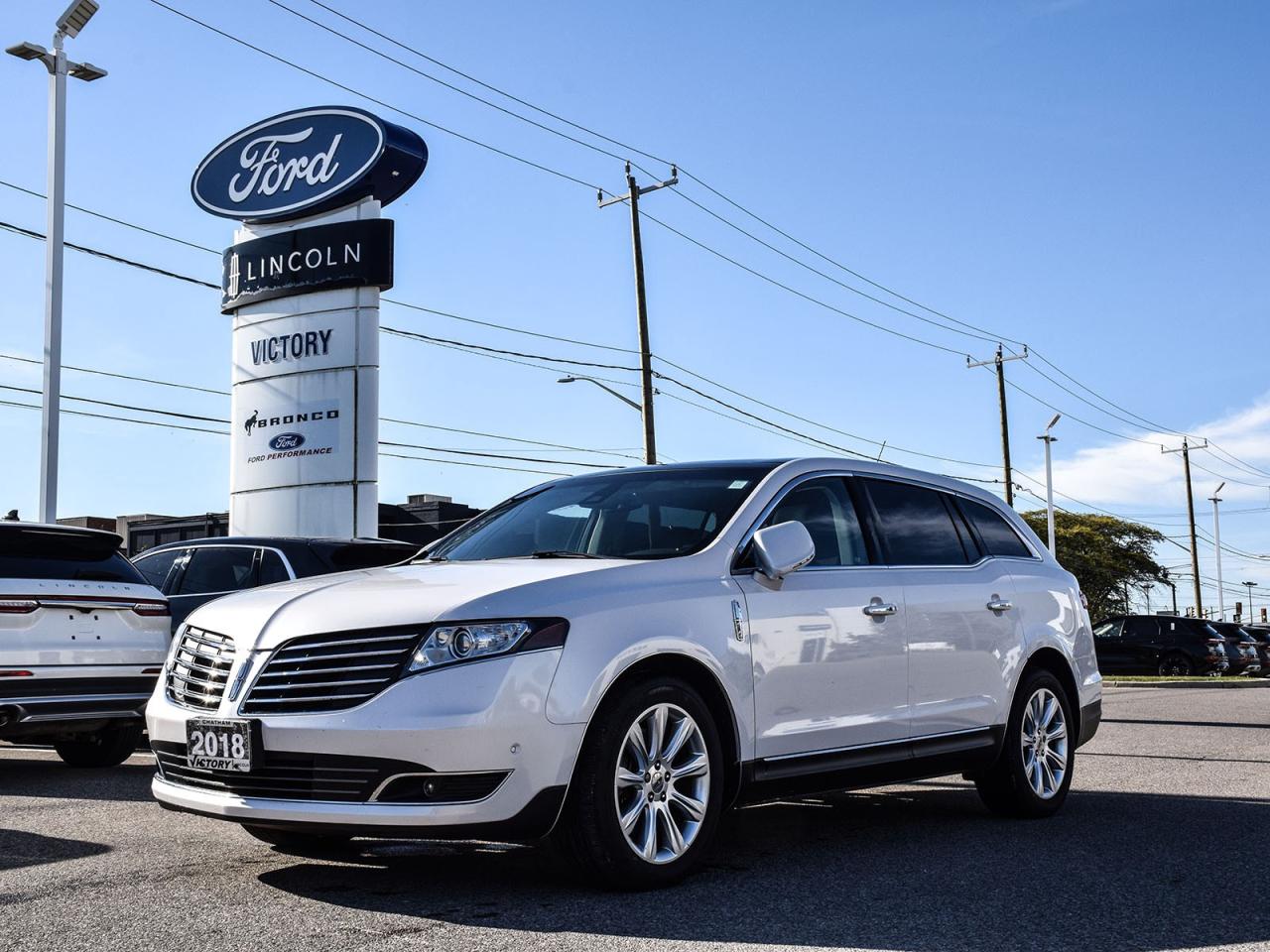 <p><strong>NOW AVAILABLE AT VICTORY LINCOLN</strong></p>

<p>???????????????????????????????????????</p>

<p><strong>2018 LINCOLN MKT ELITE</strong></p>

<p><br />
201A Package | Driver Technology Package | Intelligent All-Wheel Drive</p>

<p>Luxury, comfort, and power converge in the 2018 Lincoln MKT Elite. With three rows of refined seating, advanced driver-assist technology, and a smooth, commanding ride, this premium crossover delivers first-class travel for every passenger.</p>

<p>???????????????????????????????????????</p>

<p><strong>POWER & PERFORMANCE</strong><br />
? 3.5L Twin-Turbocharged V6 Engine (365 HP / 350 lb-ft Torque)<br />
? 6-Speed SelectShift® Automatic Transmission<br />
? Intelligent All-Wheel Drive (AWD)<br />
? Adaptive Suspension System</p>

<p>???????????????????????????????????????</p>

<p><strong>ELITE 201A PACKAGE</strong><br />
 Premium Leather-Trimmed Heated & Cooled Front Seats<br />
 PowerFold® Third-Row Seat<br />
 Heated Second-Row Captains Chairs<br />
 Tri-Zone Electronic Automatic Temperature Control<br />
 THX® II Certified Premium Audio System<br />
 Panoramic Vista Roof®<br />
 Power Tilt & Telescoping Steering Column with Memory</p>

<p>???????????????????????????????????????</p>

<p><strong>DRIVER TECHNOLOGY PACKAGE</strong><br />
? Adaptive Cruise Control with Forward Collision Warning<br />
? Lane Keeping System<br />
? Active Park Assist<br />
? Blind Spot Information System (BLIS®) with Cross-Traffic Alert<br />
? Rain-Sensing Wipers<br />
? Auto High-Beam Headlamps</p>

<p>???????????????????????????????????????</p>

<p><strong>INTERIOR & EXTERIOR HIGHLIGHTS</strong><br />
? Power Hands-Free Liftgate<br />
? HID Headlamps & LED Taillamps<br />
? 20 Polished Aluminum Wheels<br />
? Remote Start System<br />
? Intelligent Access with Push-Button Start<br />
? Power-Folding, Heated Side Mirrors with Memory</p>

<p>???????????????????????????????????????</p>

<hr />
<p><strong>Special Offer:</strong><br />
Financing Special: Listed price available on approved credit for financed purchases. Pricing may vary with alternative payment methods.</p>

<p><strong>Peace of Mind Included:</strong><br />
? 3-Month Comprehensive Warranty (for vehicles under 10 years old & under 160,000 km)<br />
? No-Haggle, Live Market Pricing  Transparent & Competitive<br />
? All-Inclusive Pricing: Fees, Reconditioning, and Full Detailing Included (Taxes & Licensing Extra)</p>

<hr />
<p><strong>Additional Details:</strong><br />
 Keys: Standard with one key. Additional keys (if provided by the previous owner) included at no cost. Optional key purchases available upon request.</p>

<p>Visit Victory Ford Lincoln Today<br />
Schedule your appointment to experience this exceptional vehicle.</p>