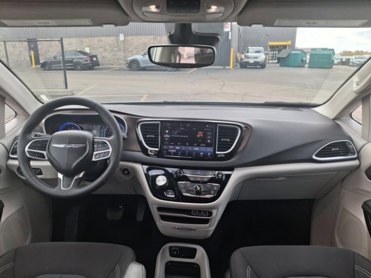 2024 Dodge Grand Caravan SXT | Nav | Heated Wheel + Seats | Power Sliders + Liftgate | Remote Start | BSM | and More ! Photo