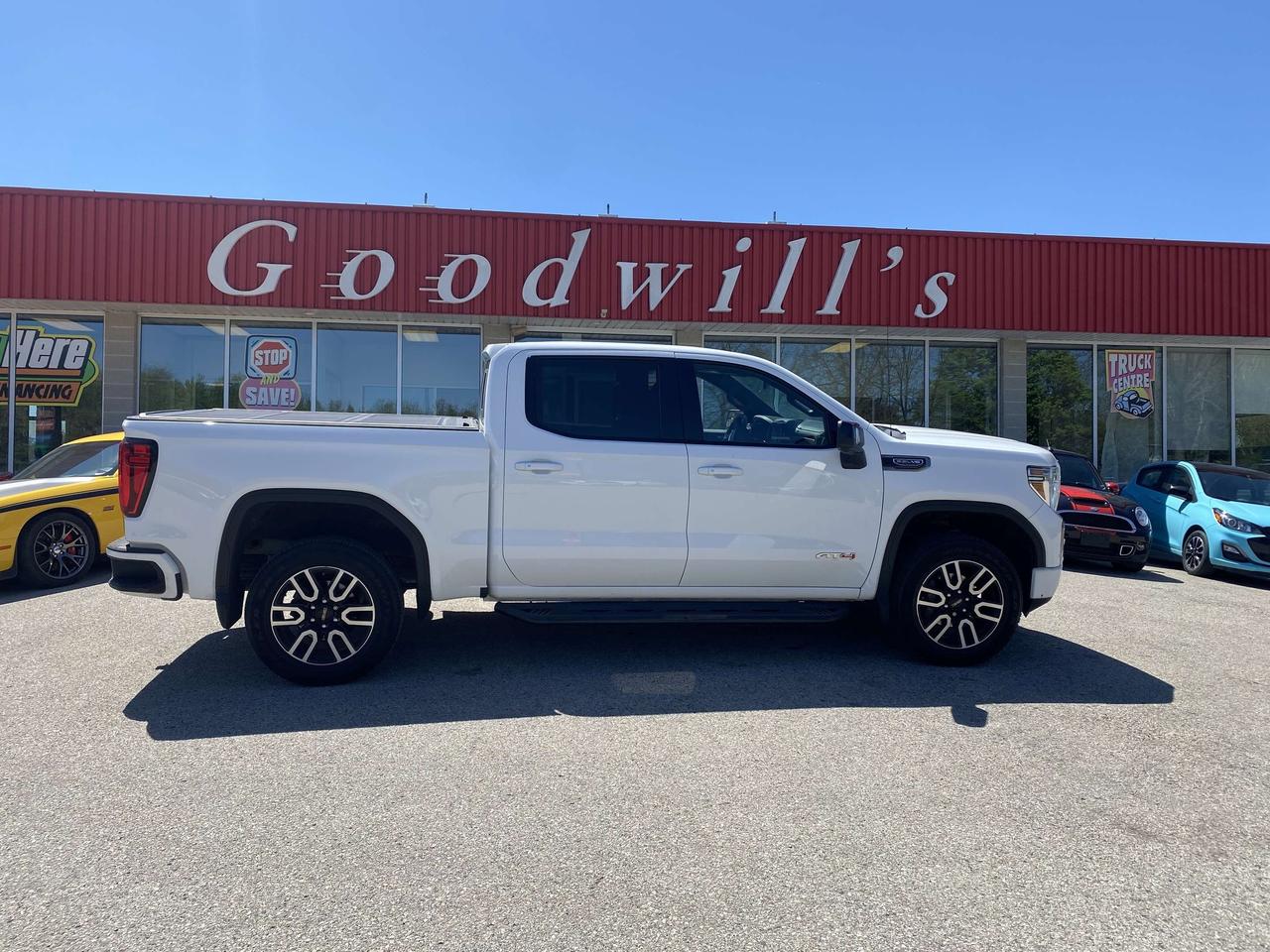 The 2020 GMC Sierra 1500 AT4 is a rugged and upscale full-size pickup designed for both off-road prowess and everyday utility. This four-door crew cab model offers ample space and comfort for passengers, typically seating up to five. It features a powerful 5.3L V8 engine and a capable four-wheel-drive system, ideal for handling tough terrain or towing heavy loads. Safety is addressed with standard equipment like Anti-lock Braking System (ABS), Electronic Stability Control, Traction Control, and a Backup Camera. Optional advanced features include Blind Spot Warning, Lane Departure Warning, Forward Collision Warning, and Pedestrian Automatic Emergency Braking. The 2020 Sierra AT4 stands out with its distinctive styling, robust performance, and well-rounded safety suite, making it a strong contender in the pickup truck segment. HEATED/ COOLED LEATHER SEATS, REMOTE START, BACK UP CAMERA, BLUETOOTH, SUNROOF! APPLY ONLINE FOR PREAPPROVAL ON FINANCING TODAY Low bank financing rates! Good or bad credit welcome. Let us help restore your credit history. In house financing available as well at reasonable rates! Easy online credit application 24/7 on our website. We have over 250 quality pre-owned vehicles in stock at all times with fresh units arriving daily! Click our banner to view our entire inventory. Buy with confidence when you shop at Goodwills . We are a family owned business serving the community and many other cities such as Kitchener, London, St. Thomas, Tillsonburg, Cambridge, Guelph, Mississauga, Hamilton, Brantford, Oakville, Ingersoll and Woodstock. Vehicle history reports are always available and we are a full disclosure dealer. We service what we sell in our large six bay service shop. Our vehicles are certified and detailed. Of course trade-ins are always welcome. We thank you for your consideration at Goodwills, where you will find big city selection at small town pricing. All prices are plus HST and LICENSING