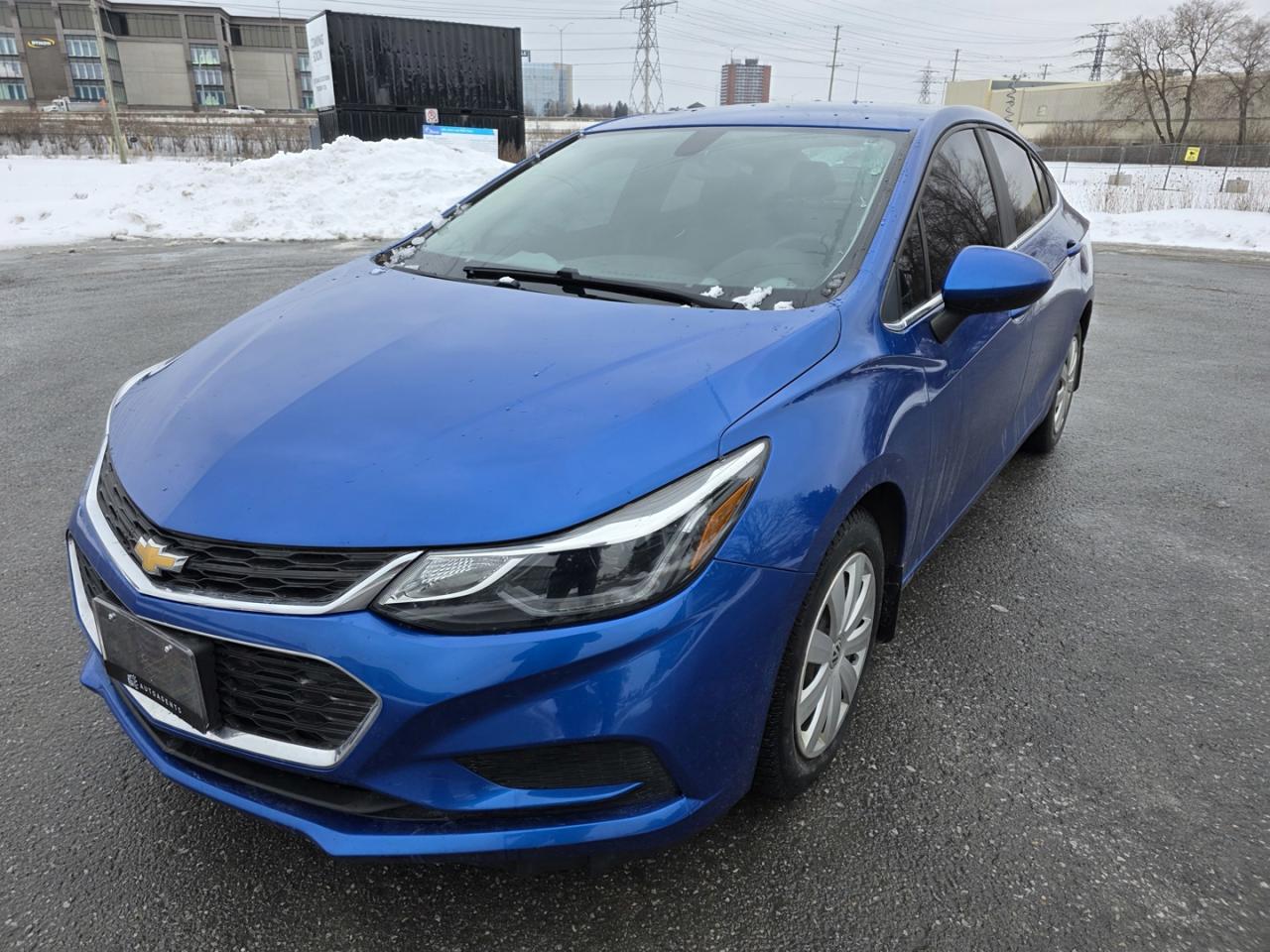<p>The 2017 Chevrolet Cruze LT Auto offers a balanced mix of efficiency, comfort, and modern technology. Powered by a 1.4L turbocharged engine paired with a smooth automatic transmission, it delivers strong fuel economy and responsive performance. This LT model includes key convenience features such as remote start, keyless entry, cruise control, air conditioning, and a 6-speaker sound system. Inside, it features premium cloth seating, a power-adjustable drivers seat, heated front seats, a leather-wrapped steering wheel with audio and phone controls, and a 60/40 split-fold rear seat for added cargo flexibility. Technology highlights include a 7-inch Chevrolet MyLink touchscreen with Apple CarPlay, Android Auto, Bluetooth audio and hands-free calling, USB ports, voice recognition, and available OnStar with 4G LTE Wi-Fi capability. Safety features include a rearview camera, stability and traction control, ABS brakes, a full suite of airbags, tire pressure monitoring, and optional advanced systems depending on configuration such as rear cross-traffic alert, lane departure warning, and blind-spot monitoring. Exterior features include alloy wheels, automatic headlights, LED daytime running lights, heated and power-adjustable side mirrors, and a sleek aerodynamic body design. The 2017 Cruze LT Auto combines practicality, efficiency, and technology in a compact sedan thats ready for everyday driving.<br><br>Book your test drive today! - </p><p>Financing and Extended Warranty Available.</p>