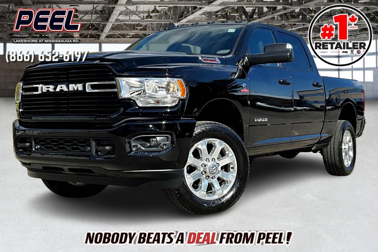 COME SEE WHY NOBODY BEATS A DEAL FROM PEEL! Your Source for ALL make and models used cars and trucks. Canadas #1 Stellantis Retailer for 9 years & counting!!

2021 Ram 2500 Big Horn Crew Cab 4X4 | 6.7L Cummins Turbocharged Diesel Engine | Diamond Black Crystal Pearl | Premium Cloth Front Bucket Seats | Uconnect 8.4" Touchscreen Display | Sport Appearance Package | Heated Seats | Heated Steering Wheel | Remote Start | Bluetooth | Apple CarPlay & Android Auto | Level 1 Equipment Group | Park-sense Front & Rear Parking Sensors | Anti-spin Differential Rear Axle | Class V Hitch Receiver | Snow Chief Group

One Owner

Built to handle the toughest jobs with ease, this 2021 Ram 2500 Big Horn Crew Cab 4X4 powered by the legendary 6.7L Cummins Turbo Diesel delivers unmatched pulling power and long-lasting durability. Its rugged Diamond Black Crystal Pearl finish complements the aggressive Sport Appearance Package, while the spacious cabin keeps you comfortable with premium cloth bucket seats, heated surfaces, and a heated steering wheel for cold-weather days. The Uconnect 8.4" touchscreen with Apple CarPlay, Android Auto, and Bluetooth integration keeps you connected on the go, and the Level 1 Equipment Group adds practical upgrades that make daily use easier. With Park-Sense front and rear parking sensors, an anti-spin differential rear axle, and a heavy-duty Class V hitch, its perfectly equipped for towing, hauling, or tackling demanding worksites. The Snow Chief Group enhances capability even further for all-season reliability. This Ram 2500 Big Horn is the ideal mix of muscle, comfort, and refinement, built for those who demand performance without compromise.
______________________________________________________

Engage & Explore with Peel Chrysler: Whether youre inquiring about our latest offers or seeking guidance, 1-866-652-6197 connects you directly. Dive deeper online or connect with our team to navigate your automotive journey seamlessly.

WE TAKE ALL TRADES & CREDIT. WE SHIP ANYWHERE IN CANADA! OUR TEAM IS READY TO SERVE YOU 7 DAYS!
______________________________________________________
Our advertised prices are for consumers (i.e end users) only. 

*FREE CarFax (click the link above to check it out at no cost to you!)*

*FULLY CERTIFIED! (Have you seen some of these other dealers stating in their advertisements that certification is an additional fee? NOT HERE! Our certification is already included in our low sale prices to save you more!)

______________________________________________________

Peel Chrysler  A Trusted Destination: Based in Port Credit, Ontario, we proudly serve customers from all corners of Ontario and Canada including Toronto, Oakville, North York, Richmond Hill, Ajax, Hamilton, Niagara Falls, Brampton, Thornhill, Scarborough, Vaughan, London, Windsor, Cambridge, Kitchener, Waterloo, Brantford, Sarnia, Pickering, Huntsville, Milton, Woodbridge, Maple, Aurora, Newmarket, Orangeville, Georgetown, Stouffville, Markham, North Bay, Sudbury, Barrie, Sault Ste. Marie, Parry Sound, Bracebridge, Gravenhurst, Oshawa, Ajax, Kingston, Innisfil and surrounding areas. On our website www.peelchrysler.com, you will find a vast selection of new vehicles including the new and used Ram 1500, 2500 and 3500. Chrysler Grand Caravan, Chrysler Pacifica, Jeep Cherokee, Wrangler and more. All vehicles are priced to sell. We deliver throughout Canada. website or call us 1-866-652-6197. 

Disclaimer Statement: At Peel Chrysler, your satisfaction is our priority. While many pre-owned vehicles originally come with two keys, variations may occur based on trade-ins, and all Peel Chrysler Pre-Owned Vehicles come standard with one key. Any extras provided by the previous owner will be included with your purchase, and additional keys can be bought at the time of sale. Online prices and payments are for finance purchases. Used vehicles that are being financed are subject to a $499 (^$1500 non-prime) financing fee, while cash purchases (certified cheque, bank draft, or wire transfer) on used vehicles have a $2,000 surcharge ( online price + $2,000). Cash purchases of new vehicles only incur applicable taxes and licensing fees, and those priced above $100,000 (including accessories or add-ons) are subject to a federal luxury tax. Optional finance and lease terms are available, and if trading in a vehicle with an outstanding loan balance requiring Peel Chrysler to facilitate the lien payout, a Lien Payout Fee of $349 applies. Prices, rates, and payments are subject to change without notice. While we strive for accuracy, occasional technical or human errors may occur, so we encourage verifying all vehicle details, including features, options, materials, and specifications, with a Peel Chrysler representative by contacting us or visiting our dealership. Experience seamless convenience with our nationwide delivery options. Visit our website or contact us for more details.