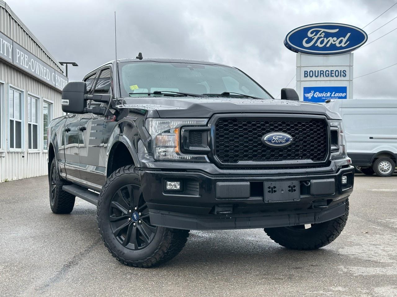 <p>Unleash the power and capability of the black 2020 Ford F-150 XLT 4×4 with its robust handling, perfect for tackling any terrain. The muscular exterior design of this truck is complemented by an impressive 3.5L 6-cylinder engine, making it both stylish and powerful on the road.</p><p>Step inside the all-black interior where comfort meets functionality. Enjoy convenience with features such as keyless entry and power windows. The truck's practical design doesn't compromise on style, offering an inviting ambiance for both driver and passengers.</p><p>Stay ahead in safety and technology with this F-150's backup camera, brake assist, and responsive automatic transmission, making your driving experience not only enjoyable but secure. This truck is built for those who require versatility and performance.</p><p>Whether you're transporting heavy loads, embarking on a weekend adventure, or just need a reliable truck for daily tasks, the 2020 Ford F-150 XLT is suited to meet all your demands. Contact our dealership today to learn more about this exceptional vehicle and schedule a test drive.</p> <p><strong>Why Choose the Bourgeois Auto Group?</strong></p><p>For 80 years, Bourgeois Auto Group has been delivering exceptional automotive experiences. Our factor trained teams work to ensure you receive the shopping experience you deserve; whether you're looking for a new or new-to-you vehicle.</p><p>Shop 24/7 with our online showroom and chat service, ensuring convenience every step of the way. No hidden fees, full disclosure, and every pre-owned vehicle comes with a Carfax® report for peace of mind.</p><p>We offer a wide selection of pre-owned vehicles, all competitively priced using real-time market data. Get the best deal on your purchase and trade-in with our free Live Market Analysis report.</p><p>Looking to sell your car? We buy any make or modelno purchase required. Our simple to use online trade valuation tool will provide you with a clear, transparent selling experience whether you buy our car or not.</p><p>Backed by hundreds dedicated employees across 4 convenient locations, were here to meet all your automotive needs. Visit us in Midland or Parry Sound and explore our inventory or schedule your next service today.</p> <p><strong>Financing Your Next Vehicle with Bourgeois Motors Ford in Midland:</strong></p><p>At Bourgeois Motors Ford, we make financing your next vehicle simple and stress-free! Our team works with trusted lenders to find flexible options tailored to your budget. Drive away with confidenceapply today!</p><p>Take advantage of our online pre-qualification tool, backed by Equifax and TD Bank to find the payment that works for you. Simply <a href=https://www.bourgeoismotors.com/free-credit-check/ rel=nofollow><strong>CLICK HERE</strong></a><strong> </strong>to use our secure online credit tool with no impact to your credit.</p>