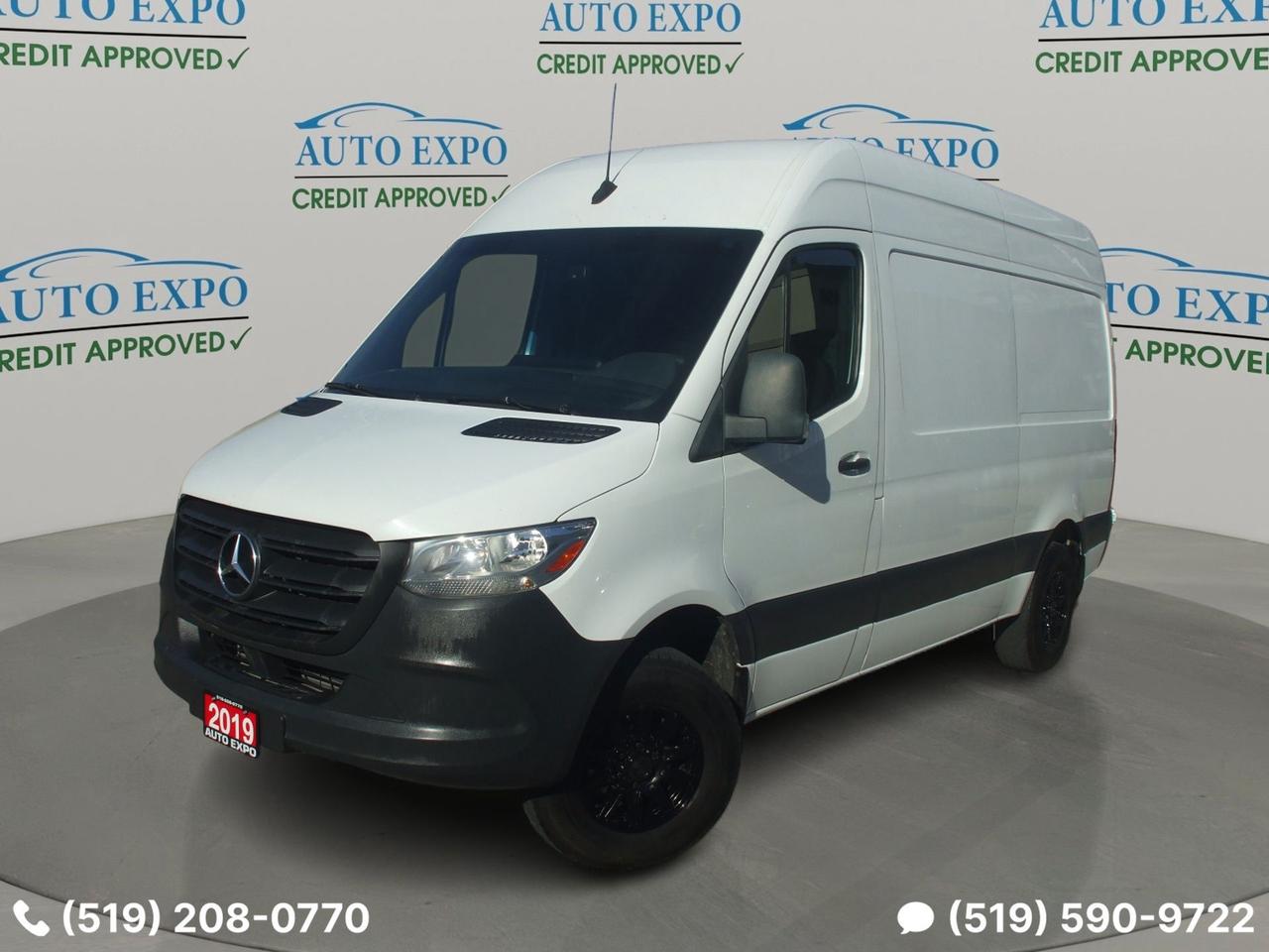 <p>Looking for a versatile and reliable workhorse? Check out this certified, rebuilt 2019 Mercedes-Benz Sprinter 1500 at Auto Expo Inc.! This white beauty boasts a practical and spacious design, ready to tackle any job. With its iconic Mercedes-Benz build quality and a reputation for dependability, this Sprinter is ready to go the distance with only 90,000 km on the odometer. The interior features a comfortable gray design that is ready for you to customize.</p><p>This Sprinter 1500 is designed to make your life easier. Featuring a durable gasoline engine paired with an automatic transmission, this van is ready to get the job done. This particular model boasts a 144 roof and is a rear-wheel drive. Whether you are transporting cargo or converting it for your own personal adventures, this Sprinter provides the perfect foundation.</p><p>Here are five reasons why this Sprinter stands out:</p><ul><li><strong>Certified & Rebuilt:</strong> Enjoy peace of mind knowing this Sprinter has been thoroughly inspected and rebuilt to ensure its quality and reliability.</li><li><strong>Backup Cam:</strong> Navigate tight spots with ease, thanks to the integrated backup camera.</li><li><strong>Keyless Entry:</strong> Unlock and go with the convenience of keyless entry.</li><li><strong>Spacious Interior:</strong> The Sprinter offers a generous cargo area, perfect for carrying equipment, supplies, or anything else your business or lifestyle demands.</li><li><strong>Fuel-Efficient Performance:</strong> Designed with efficiency in mind, helping you save on fuel costs.</li></ul><p><strong><em>Powered by AutoIntelligence&trade;</em></strong> Vehicle information has been generated using artificial intelligence and is provided for informational purposes only. While efforts are made to ensure accuracy, please confirm all details directly with the dealer.</p><ol style=border: 0px solid #e5e7eb; box-sizing: border-box; --tw-border-spacing-x: 0; --tw-border-spacing-y: 0; --tw-translate-x: 0; --tw-translate-y: 0; --tw-rotate: 0; --tw-skew-x: 0; --tw-skew-y: 0; --tw-scale-x: 1; --tw-scale-y: 1; --tw-scroll-snap-strictness: proximity; --tw-ring-offset-width: 0px; --tw-ring-offset-color: #fff; --tw-ring-color: rgba(59,130,246,.5); --tw-ring-offset-shadow: 0 0 #0000; --tw-ring-shadow: 0 0 #0000; --tw-shadow: 0 0 #0000; --tw-shadow-colored: 0 0 #0000; list-style: none; margin: 0px; padding: 0px; font-family: Inter, sans-serif;><li style=border: 0px solid #e5e7eb; box-sizing: border-box; --tw-border-spacing-x: 0; --tw-border-spacing-y: 0; --tw-translate-x: 0; --tw-translate-y: 0; --tw-rotate: 0; --tw-skew-x: 0; --tw-skew-y: 0; --tw-scale-x: 1; --tw-scale-y: 1; --tw-scroll-snap-strictness: proximity; --tw-ring-offset-width: 0px; --tw-ring-offset-color: #fff; --tw-ring-color: rgba(59,130,246,.5); --tw-ring-offset-shadow: 0 0 #0000; --tw-ring-shadow: 0 0 #0000; --tw-shadow: 0 0 #0000; --tw-shadow-colored: 0 0 #0000;>&nbsp;</li></ol><p style=border: 0px solid #e5e7eb; box-sizing: border-box; --tw-border-spacing-x: 0; --tw-border-spacing-y: 0; --tw-translate-x: 0; --tw-translate-y: 0; --tw-rotate: 0; --tw-skew-x: 0; --tw-skew-y: 0; --tw-scale-x: 1; --tw-scale-y: 1; --tw-scroll-snap-strictness: proximity; --tw-ring-offset-width: 0px; --tw-ring-offset-color: #fff; --tw-ring-color: rgba(59,130,246,.5); --tw-ring-offset-shadow: 0 0 #0000; --tw-ring-shadow: 0 0 #0000; --tw-shadow: 0 0 #0000; --tw-shadow-colored: 0 0 #0000; margin: 0px; font-family: Inter, sans-serif;><a style=border: 0px solid #e5e7eb; box-sizing: border-box; --tw-border-spacing-x: 0; --tw-border-spacing-y: 0; --tw-translate-x: 0; --tw-translate-y: 0; --tw-rotate: 0; --tw-skew-x: 0; --tw-skew-y: 0; --tw-scale-x: 1; --tw-scale-y: 1; --tw-scroll-snap-strictness: proximity; --tw-ring-offset-width: 0px; --tw-ring-offset-color: #fff; --tw-ring-color: rgba(59,130,246,.5); --tw-ring-offset-shadow: 0 0 #0000; --tw-ring-shadow: 0 0 #0000; --tw-shadow: 0 0 #0000; --tw-shadow-colored: 0 0 #0000; text-decoration: inherit; href=https://vhr.carfax.ca/?id=UtCpj4VLd4jLufa8QUJSSLC6AKr6GFb/&_jstate=PxI2DHNk_lIvHhXVe3VIQT8SNgxzZP5SLx4V1Xt1SEH5cvzCF-VBt_xVS-ui8_TFlnsEURpiwNGaVVxzWFaGADcNcJQZU8At7nIjHz-5jAlg3DperideEvzTQStTs9eRx_SMjktlF2JTsu2Eyo8NxM0BPt5THpIq5SaWrwYVBmLZq5NYvkiwA1de4QDxVTffSdhfCeCX-jJZxPZEN8YHrRWXUfV-28IA7WtbWuQSQc-oKHNjlF7pIWo-rJdf_j2V859AHPaUBvKgVf8DbgLHBf3lGTiTCltWbyR9-qzi-YGZu-40auMEehJJNmrRczs_pe0H3oVsVvJQI7Q-yZm0w8UjyVa2ZpNxvjO1A0_wSBndadM9g3svK1EwygD4H9DbfPQUchKkgFKB7sZGyNCf-DNG1G2Zk4a-GT5zu0s0vIBN8cTWCLXWjEMk8Ua2m486 target=_blank rel=noopener><span style=border: 0px solid #e5e7eb; box-sizing: border-box; --tw-border-spacing-x: 0; --tw-border-spacing-y: 0; --tw-translate-x: 0; --tw-translate-y: 0; --tw-rotate: 0; --tw-skew-x: 0; --tw-skew-y: 0; --tw-scale-x: 1; --tw-scale-y: 1; --tw-scroll-snap-strictness: proximity; --tw-ring-offset-width: 0px; --tw-ring-offset-color: #fff; --tw-ring-color: rgba(59,130,246,.5); --tw-ring-offset-shadow: 0 0 #0000; --tw-ring-shadow: 0 0 #0000; --tw-shadow: 0 0 #0000; --tw-shadow-colored: 0 0 #0000; font-weight: bolder; font-size: 18px; color: #333333;>OMVIC Licensed, UCDA & Carfax Member,,,</span></a></p><p style=border: 0px solid #e5e7eb; box-sizing: border-box; --tw-border-spacing-x: 0; --tw-border-spacing-y: 0; --tw-translate-x: 0; --tw-translate-y: 0; --tw-rotate: 0; --tw-skew-x: 0; --tw-skew-y: 0; --tw-scale-x: 1; --tw-scale-y: 1; --tw-scroll-snap-strictness: proximity; --tw-ring-offset-width: 0px; --tw-ring-offset-color: #fff; --tw-ring-color: rgba(59,130,246,.5); --tw-ring-offset-shadow: 0 0 #0000; --tw-ring-shadow: 0 0 #0000; --tw-shadow: 0 0 #0000; --tw-shadow-colored: 0 0 #0000; margin: 0px; font-family: Inter, sans-serif;><span style=border: 0px solid #e5e7eb; box-sizing: border-box; --tw-border-spacing-x: 0; --tw-border-spacing-y: 0; --tw-translate-x: 0; --tw-translate-y: 0; --tw-rotate: 0; --tw-skew-x: 0; --tw-skew-y: 0; --tw-scale-x: 1; --tw-scale-y: 1; --tw-scroll-snap-strictness: proximity; --tw-ring-offset-width: 0px; --tw-ring-offset-color: #fff; --tw-ring-color: rgba(59,130,246,.5); --tw-ring-offset-shadow: 0 0 #0000; --tw-ring-shadow: 0 0 #0000; --tw-shadow: 0 0 #0000; --tw-shadow-colored: 0 0 #0000; text-decoration-line: underline; font-size: 18pt;><em style=border: 0px solid #e5e7eb; box-sizing: border-box; --tw-border-spacing-x: 0; --tw-border-spacing-y: 0; --tw-translate-x: 0; --tw-translate-y: 0; --tw-rotate: 0; --tw-skew-x: 0; --tw-skew-y: 0; --tw-scale-x: 1; --tw-scale-y: 1; --tw-scroll-snap-strictness: proximity; --tw-ring-offset-width: 0px; --tw-ring-offset-color: #fff; --tw-ring-color: rgba(59,130,246,.5); --tw-ring-offset-shadow: 0 0 #0000; --tw-ring-shadow: 0 0 #0000; --tw-shadow: 0 0 #0000; --tw-shadow-colored: 0 0 #0000;><span style=border: 0px solid #e5e7eb; box-sizing: border-box; --tw-border-spacing-x: 0; --tw-border-spacing-y: 0; --tw-translate-x: 0; --tw-translate-y: 0; --tw-rotate: 0; --tw-skew-x: 0; --tw-skew-y: 0; --tw-scale-x: 1; --tw-scale-y: 1; --tw-scroll-snap-strictness: proximity; --tw-ring-offset-width: 0px; --tw-ring-offset-color: #fff; --tw-ring-color: rgba(59,130,246,.5); --tw-ring-offset-shadow: 0 0 #0000; --tw-ring-shadow: 0 0 #0000; --tw-shadow: 0 0 #0000; --tw-shadow-colored: 0 0 #0000; font-weight: bolder;>we specialize in Domestic and import vehicles! Our wide selection offers something for every need and budget!</span></em></span></p><p style=border: 0px solid #e5e7eb; box-sizing: border-box; --tw-border-spacing-x: 0; --tw-border-spacing-y: 0; --tw-translate-x: 0; --tw-translate-y: 0; --tw-rotate: 0; --tw-skew-x: 0; --tw-skew-y: 0; --tw-scale-x: 1; --tw-scale-y: 1; --tw-scroll-snap-strictness: proximity; --tw-ring-offset-width: 0px; --tw-ring-offset-color: #fff; --tw-ring-color: rgba(59,130,246,.5); --tw-ring-offset-shadow: 0 0 #0000; --tw-ring-shadow: 0 0 #0000; --tw-shadow: 0 0 #0000; --tw-shadow-colored: 0 0 #0000; margin: 0px; font-family: Inter, sans-serif;><span style=border: 0px solid #e5e7eb; box-sizing: border-box; --tw-border-spacing-x: 0; --tw-border-spacing-y: 0; --tw-translate-x: 0; --tw-translate-y: 0; --tw-rotate: 0; --tw-skew-x: 0; --tw-skew-y: 0; --tw-scale-x: 1; --tw-scale-y: 1; --tw-scroll-snap-strictness: proximity; --tw-ring-offset-width: 0px; --tw-ring-offset-color: #fff; --tw-ring-color: rgba(59,130,246,.5); --tw-ring-offset-shadow: 0 0 #0000; --tw-ring-shadow: 0 0 #0000; --tw-shadow: 0 0 #0000; --tw-shadow-colored: 0 0 #0000; text-decoration-line: underline; font-size: 18pt;><em style=border: 0px solid #e5e7eb; box-sizing: border-box; --tw-border-spacing-x: 0; --tw-border-spacing-y: 0; --tw-translate-x: 0; --tw-translate-y: 0; --tw-rotate: 0; --tw-skew-x: 0; --tw-skew-y: 0; --tw-scale-x: 1; --tw-scale-y: 1; --tw-scroll-snap-strictness: proximity; --tw-ring-offset-width: 0px; --tw-ring-offset-color: #fff; --tw-ring-color: rgba(59,130,246,.5); --tw-ring-offset-shadow: 0 0 #0000; --tw-ring-shadow: 0 0 #0000; --tw-shadow: 0 0 #0000; --tw-shadow-colored: 0 0 #0000;><span style=border: 0px solid #e5e7eb; box-sizing: border-box; --tw-border-spacing-x: 0; --tw-border-spacing-y: 0; --tw-translate-x: 0; --tw-translate-y: 0; --tw-rotate: 0; --tw-skew-x: 0; --tw-skew-y: 0; --tw-scale-x: 1; --tw-scale-y: 1; --tw-scroll-snap-strictness: proximity; --tw-ring-offset-width: 0px; --tw-ring-offset-color: #fff; --tw-ring-color: rgba(59,130,246,.5); --tw-ring-offset-shadow: 0 0 #0000; --tw-ring-shadow: 0 0 #0000; --tw-shadow: 0 0 #0000; --tw-shadow-colored: 0 0 #0000; font-weight: bolder;>Visit us @ 450 Belmont Ave West Kitchener!</span></em></span></p>