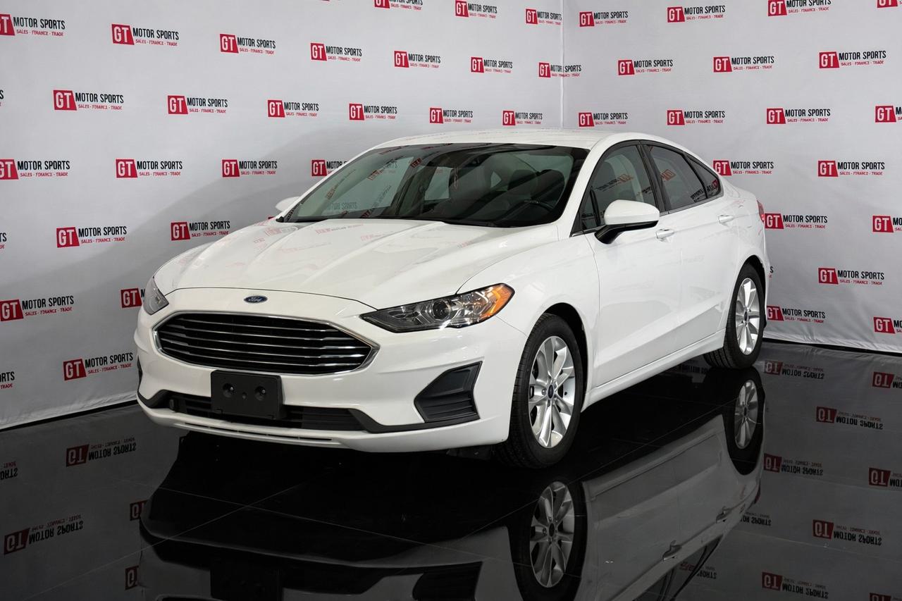 &nbsp;This 2020 Ford Fusion SE turns everyday driving into a comfortable, enjoyable experience that just feels right. Its the kind of car that makes you smile without even trying.
<div>
</div><div><br></div><div><ul><li>All credit accepted: good, bad, new to Canada, bankruptcy, collections, repossessions, student/work visas
</li><li>In-house financing available (O.A.C.)
</li><li>Low bi-weekly payments & instant approvals
</li><li>Up to 6 months no payments (interest accrues)
</li><li>Credit consolidation, unemployment insurance, negative equity coverage
</li><li>Financing, APR & payments vary by personal credit (O.A.C.)
</li></ul></div><div><br></div><div><b>Open 7 days:</b> MonThu 107, FriSat 106, Sun 103
</div><div><b>Location: </b>10-40 Hopewell Way NE, Calgary (behind Enterprise Car Rental)
</div><div><b>Contact:</b> 403-402-2015 or www.gtmotorsports.ca
</div><div>Full mechanical fitness assessment, Carfax & warranty included
</div><div>AMVIC licensed dealer
</div><div>Price based on vehicle only (Plus aftermarket, GST, and costs/charges associated with financing)</div><div><br></div><div>
</div>