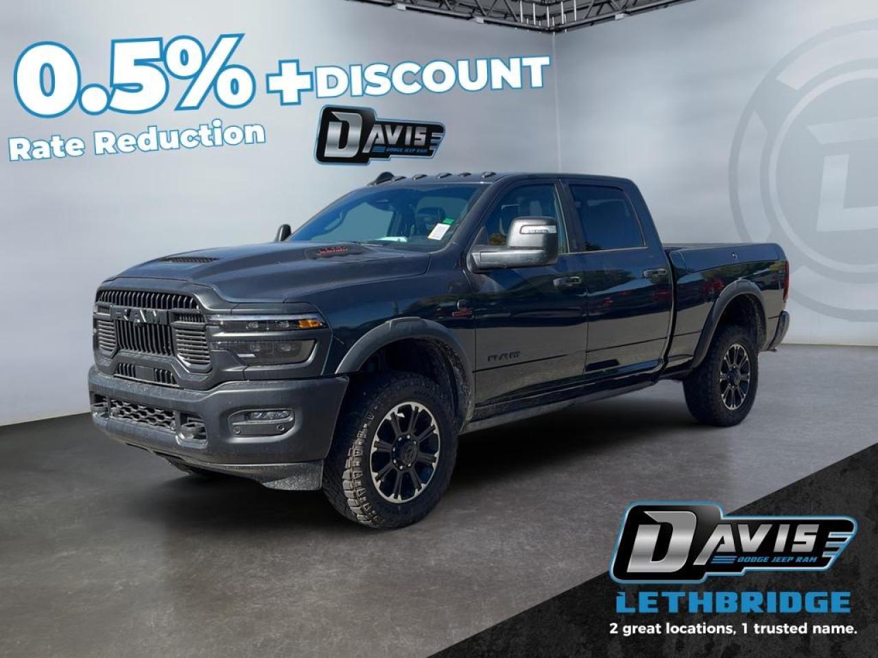 <b>Adaptive Cruise, Navigation, Heated Seats, Blind Spot Detection, Remote Start, Heated Steering Wheel!<br /> <br /></b><br /> <br /> <br />Conquer any terrain with the 2026 Ram 2500 Rebel Crew Cab in Forged Blue Metallic with Lower Two-Tone Paint. Powered by the 6.7L Cummins Turbo Diesel I6 engine paired with an 8-speed TorqueFlite HD automatic transmission and 4x4 Rebel Performance Suspension, this heavy-duty truck delivers rugged capability with trailering, off-road, and work-ready performance.<br /><br />The exterior impresses with 20 Black Diamond-Cut aluminum wheels, LT285/60R20 all-terrain tires, powder-coated bumpers, LED lighting, black wheel flares, and deployable running boards. Inside, enjoy leather-trimmed heated and ventilated bucket seats, dual-zone climate control, folding 60/40 rear seat, Uconnect 5 NAV with 14.4 touchscreen, Apple CarPlay, Android Auto, Alexa built-in, 17-speaker Harman Kardon audio, and dual wireless charging.<br /><br />Safety and convenience are enhanced with adaptive cruise control with stop, ParkView rear camera, ParkSense front/rear park assist, blind-spot monitoring with cross-path detection, Class V receiver hitch, trailer sway damping, tow hooks, and tip start. The 2026 Ram 2500 Rebel is the ultimate combination of power, luxury, and technology for work and adventure.<br /> <br />To apply right now for financing use this link: <a href=https://lethbridge.davisdodge.ca/free-credit-check/ target=_blank rel=nofollow noopener noreferrer>https://lethbridge.davisdodge.ca/free-credit-check/</a><br /><br /> <br /><br />As a premier Chrysler, Dodge, Jeep and RAM dealership, Davis Dodge proudly offers an extensive selection of new and used vehicles to meet every drivers needs. Customers across Lethbridge, Fort Macleod, Taber, Claresholm, Coaldale, and beyond trust us for daily vehicle specials, certified service and parts, and a seamless online inventory experience. <br /><br /> With competitive financing options and expert support, we make car buying easy and enjoyable. <br /><br /> Ready to hit the road? Schedule your test drive today at Davis Dodge, your trusted Chrysler, Dodge, Jeep and RAM dealer in Lethbridge, Alberta.<br /><br /> Vehicle pricing offer shown expires 2026-03-31. <br /> Come by and check out our fleet of 60+ used cars and trucks and 120+ new cars and trucks for sale in Lethbridge. o~o