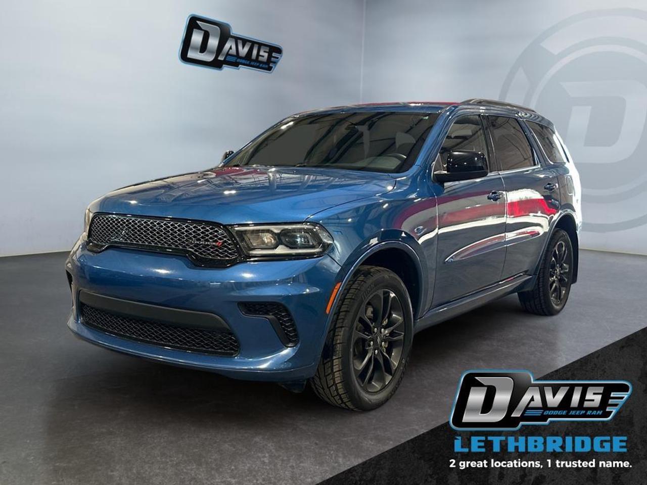 <b>3.6L V6 - Heated Seats & Steering Wheel - Remote Start - 7 Passenger - Blacktop Pkg - 20" Wheels<br /> <br /></b><br /> A real family hauler, a real SUV, and a real stylish ride, the Dodge Durango does it all. This 2024 Dodge Durango is for sale today in Lethbridge. <br /> <br />Filled with impressive standard features, this family friendly 2024 Dodge Durango is a surprising and adventurous SUV. Versatile as they come, you can manage any road you find in comfort and style, while effortlessly leading the pack in this Dodge Durango. For a capable, impressive, and versatile family SUV that can still climb mountains, this Dodge Durango is ready for your family's next big adventure. This SUV has 97,972 km. Stock number 40690 is Blue in colour and is completely accident free based on the <a href=https://vhr.carfax.ca/?id=uxvmDgukP9FuUFi5YIBUvR9I7HOVdV00 target=_blank rel=nofollow noopener noreferrer>CARFAX Report</a>. It has an Automatic transmission and is powered by a 293HP 3.6L V6 Cylinder Engine. <br /> <br /> Our Durango's trim level is SXT. This spacious and powerful SUV is decked with amazing standard features such as heated and power-adjustable front seats with cushion tilt and lumbar support, a heated leather-wrapped steering wheel, proximity keyless entry with push button start, dual-zone climate control, illuminated front cupholders, and an 8.4-inch infotainment screen with Uconnect 4. Safety features include blind spot detection with rear cross traffic alert, ParkSense rear parking sensors, and a back-up camera. This vehicle has been upgraded with the following features: Heated Seats, Heated Steering Wheel, Blind Spot Detection, Proximity Key, Climate Control, Tow Package, Rear Camera.<br /> <br />To apply right now for financing use this link: <a href=https://www.bridgecitychrysler.com/pre-approval/ target=_blank rel=nofollow noopener noreferrer>https://www.bridgecitychrysler.com/pre-approval/</a><br /><br /> <br /><br />Locally Owned & Trusted for Over 35 Years  Bridge City Chrysler in Lethbridge, AB <br /><br /> At Bridge City Chrysler, weve proudly served the Lethbridge community for more than 35 years, offering an unparalleled car buying experience. Dont just take our word for itour Google reviews speak volumes about our commitment to exceptional service. <br /><br /> Delivery & At-Home Test Drives: Convenient options to suit your lifestyle. <br /><br /> Flexible Financing for Everyone: Get the vehicle you need with financing solutions tailored to your situation. <br /><br /> Full Mechanical Inspections & Professional Cleaning: Every vehicle is thoroughly inspected and cleaned before it hits our lot.<br /><br /> We take all makes and models on trade and offer competitive pricing with inventory that changes daily. Whether you're shopping for a Chrysler, Dodge, Jeep, RAM, or FIAT, our AMVIC Licensed dealership makes it easy to browse, buy, and drive away.<br /><br /> Located in Lethbridge, AB, we proudly serve customers in Fort Macleod, Taber, Claresholm, and Coaldale. Shop online or visit us today to experience the best in sales, service, and selection. Standard bank rates apply; taxes are additional.<br /><br /> Vehicle pricing offer shown expires 2026-01-31. <br /> Come by and check out our fleet of 80+ used cars and trucks and 130+ new cars and trucks for sale in Lethbridge. o~o
