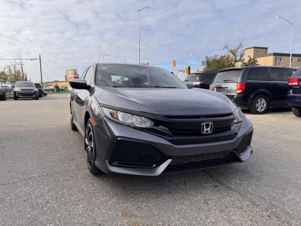 Used 2017 Honda Civic Hatchback 5dr Manual LX for sale in Winnipeg, MB