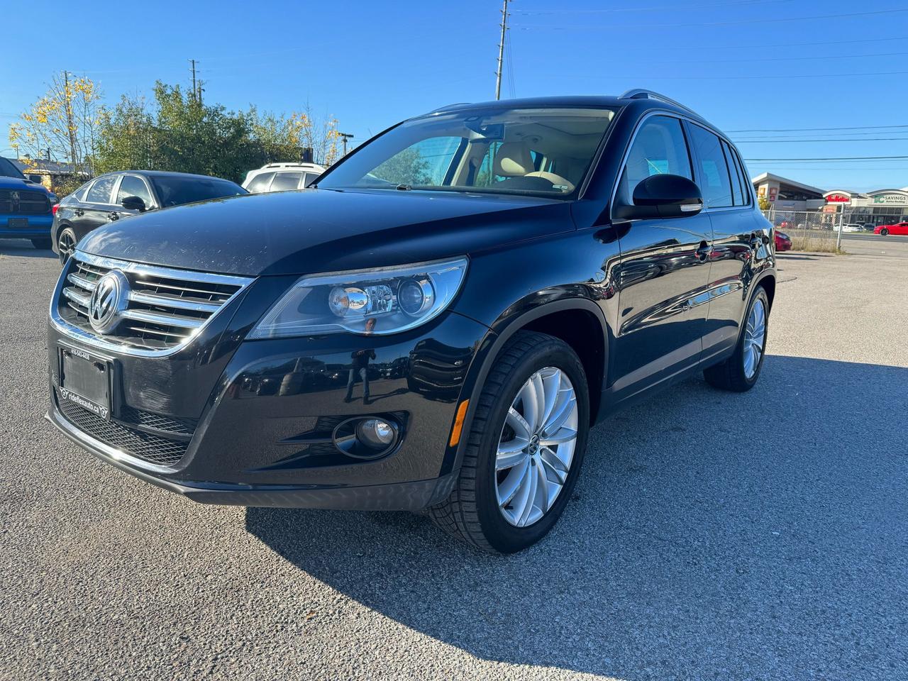 <div>2009 VW Tiguan Highline &nbsp;AWD comes in excellent condition,,,,,LOW KILOMETRES,,,CLEAN CARFAX REPORT,,,,runs & drives like brand new....Fully Loaded, Equipped with Backup Camera, Navigation System, Panoramic Sunroof, Leather interior, Power Steering Wheel, Power mirrors, heated mirrors, Power Seats, heated seats, keyless entry, push start, Power doors lock, Power tailgate, Bluetooth, Cruise Control and much more....Fully certified included in the price, HST & Licensing extra............Please contact us @ 4 1 6 5 4 3 4 4 3 8 for more details....At Rideflex Auto we are serving our clients across G.T.A, Toronto, Vaughan, Richmond Hill, Newmarket, Bradford, Markham, Mississauga, Scarborough, Pickering, Ajax, Oakville, Hamilton, Brampton, Waterloo, Burlington, Aurora, Milton, Whitby, Kitchener London, Brantford, Barrie, Milton.......</div><div>Buy with confidence from Rideflex Auto... &nbsp; &nbsp; &nbsp; &nbsp; &nbsp; &nbsp; &nbsp;&nbsp;</div><div><br></div><div><br></div>