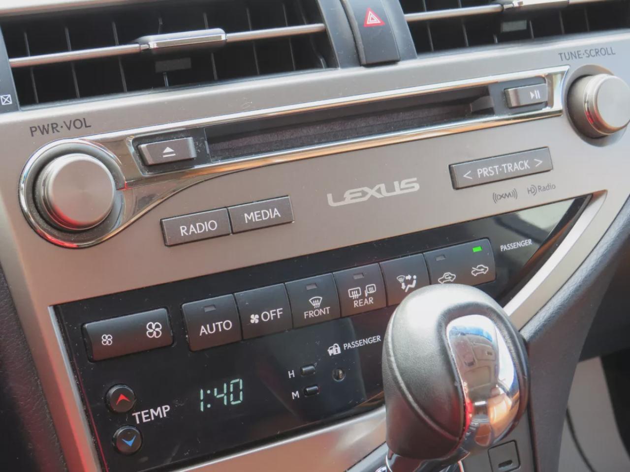 2015 Lexus RX 350 Sportdesign (**CLEAN TITLE/NO ACCIDENTS!!**SAFETY/CERTIFIED!!**AWD**ALLOY RIMS**LEATHER**SUNROOF**REVERSE CAMERA**POWER/MEMORY SEATS**PUSH BUTTON START**DIGITAL TOUCHSCREEN**CD PLAYER**REAR PRIVACY COVER**CRUISE CONTROL**BLUETOOTH**) Photo