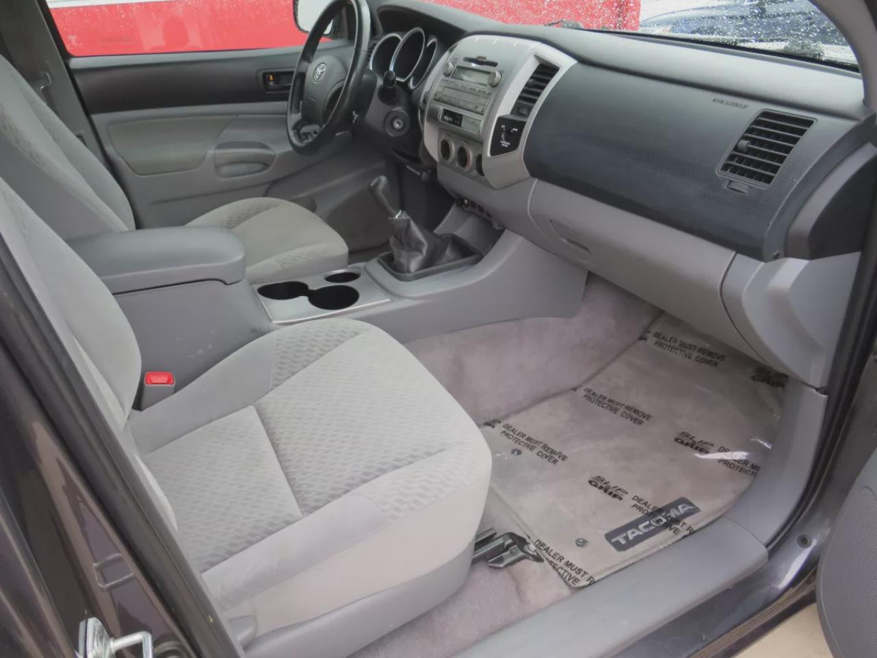 2011 Toyota Tacoma BASE (4X4**RARE!!**SAFETY/CERTIFIED!!**SOLID FRAME!!**MANUAL TRANSMISSION**A/C**TRAILER HITCH**ALLOY RIMS**POWER DOORS**POWER LOCKS**CD PLAYER**) Photo