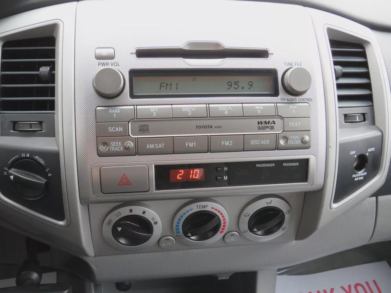 2011 Toyota Tacoma BASE (4X4**RARE!!**SAFETY/CERTIFIED!!**SOLID FRAME!!**MANUAL TRANSMISSION**A/C**TRAILER HITCH**ALLOY RIMS**POWER DOORS**POWER LOCKS**CD PLAYER**) Photo