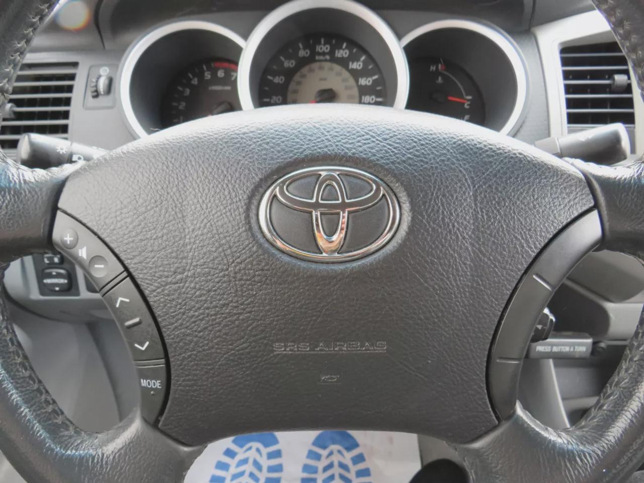 2011 Toyota Tacoma Base 4X4 | Rare | Safety Certified | Solid Frame | Manual Transmission | A/C | Trailer Hitch | Alloy Rims | Power Doors | Power Locks | CD Player Photo