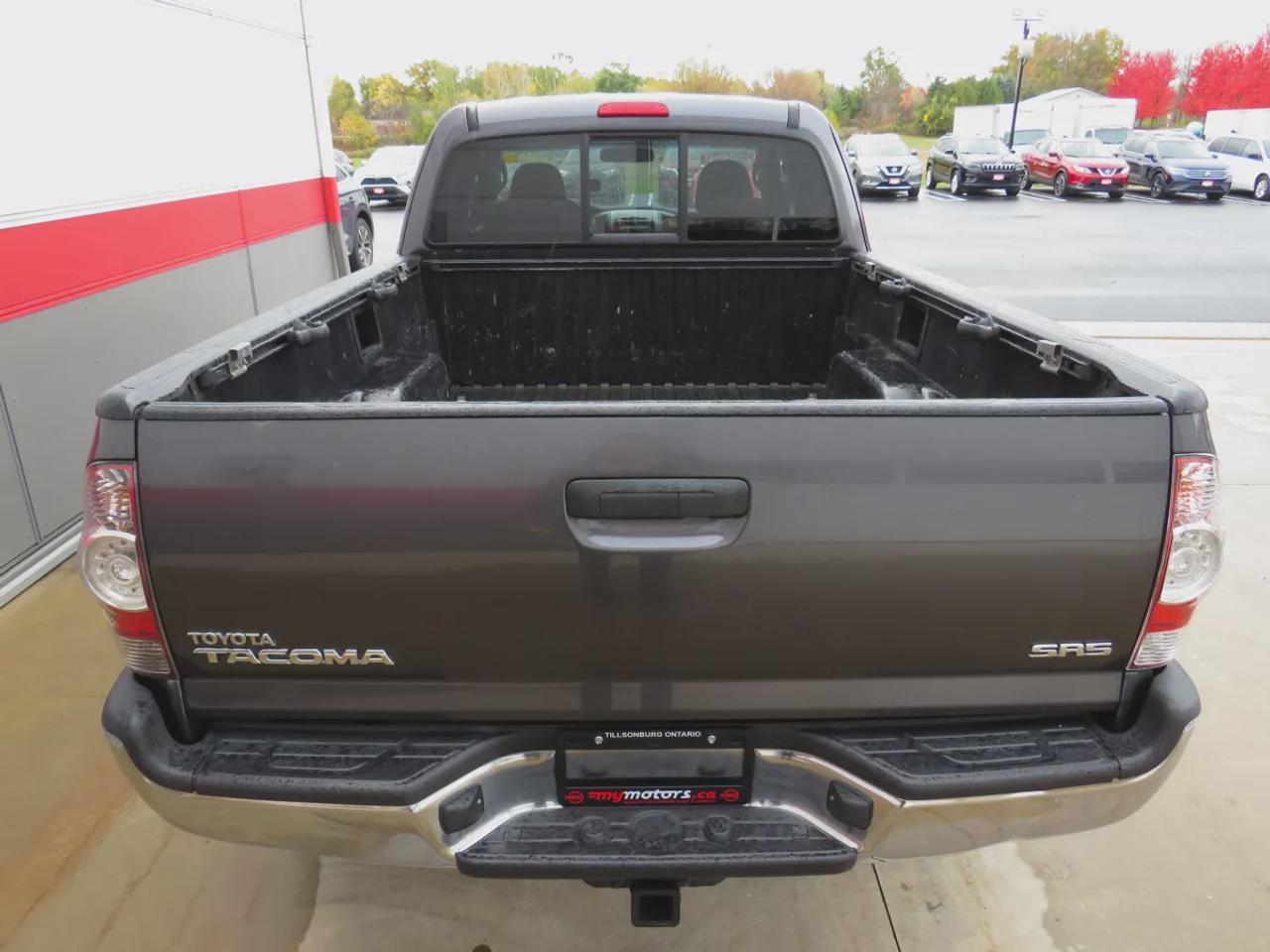 2011 Toyota Tacoma Base 4X4 | Rare | Safety Certified | Solid Frame | Manual Transmission | A/C | Trailer Hitch | Alloy Rims | Power Doors | Power Locks | CD Player Photo