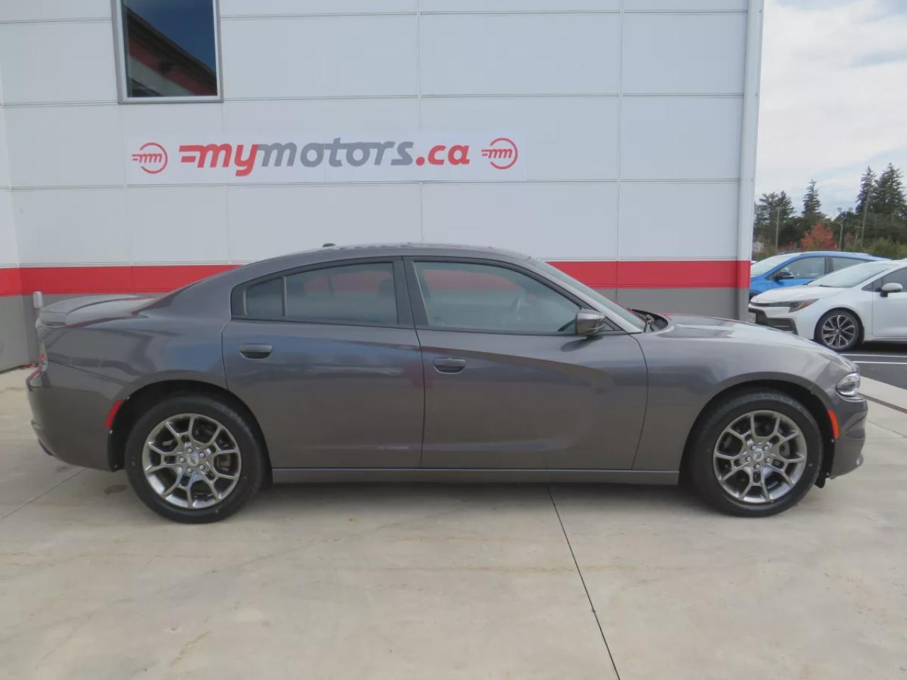 2017 Dodge Charger SXT (**SAFETY/CERTIFIED!!**AWD**ALLOY RIMS**REMOTE START**NAVIGATION**SUNROOF**FOG LIGHTS**REVERSE CAMERA**DUAL CLIMATE CONTROL**POWER SEATS**PUSH BUTTON START**HEATED SEATS**DIGITAL TOUCHSCREEN**CRUISE CONTROL**BLUETOOTH**) Photo
