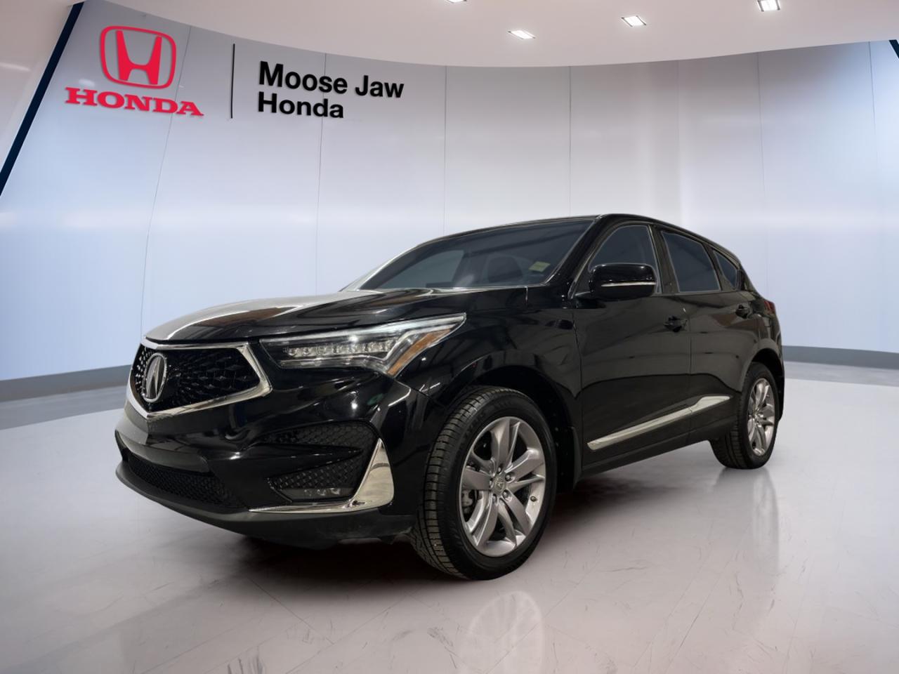 Experience refined luxury and advanced performance with the 2019 Acura RDX Platinum Elite, now available at Moose Jaw Honda. This premium SUV combines sophisticated styling with innovative technology, making it an ideal choice for drivers seeking comfort, capability, and reliability. With only 96,500 km on the odometer, this used RDX Platinum Elite offers exceptional value and enduring quality for your next adventure.

FEATURES OF THE RDX Platinum Elite  
»» Panoramic moonroof for an open-air driving experience  
»» Integrated navigation system for effortless journeys  
»» Surround-view camera system enhances parking confidence  
»» Premium audio system for immersive sound quality  

ADVANCED SAFETY FEATURES  
»» Blind spot monitoring for added lane-change security  
»» Forward collision warning system with emergency braking  
»» Lane keeping assist for improved highway safety  
»» Adaptive cruise control for stress-free commuting  

PERFORMANCE AND EFFICIENCY  
»» 2.0L turbocharged 4-cylinder i-VTEC engine  
»» 10-speed automatic transmission with paddle shifters  
»» All-wheel drive traction for superior control  
»» Responsive acceleration and confident handling  

COMFORT AND CONVENIENCE  
»» Dual-zone automatic climate control  
»» Power-adjustable front seats for personalized comfort  
»» Hands-free power tailgate for easy loading  
»» Heated steering wheel for cold Canadian winters  

TECHNOLOGY AND CONNECTIVITY  
»» Touchscreen infotainment with Apple CarPlay integration  
»» Bluetooth hands-free connectivity  
»» Wireless charging pad for compatible devices  
»» USB ports for convenient charging options  

CARGO SPACE  
»» Spacious rear cargo area for luggage or gear  
»» Split-folding rear seats for flexible storage  
»» Underfloor storage compartment for valuables  
»» Low lift-over height for easy loading and unloading  

WHAT OTHER OWNERS LIKE  
»» Smooth, quiet ride quality  
»» User-friendly infotainment system  
»» Comfortable seating for long drives  
»» Impressive all-weather capability  

This 2019 Acura RDX Platinum Elites VIN is: 5J8TC2H94KL808387.