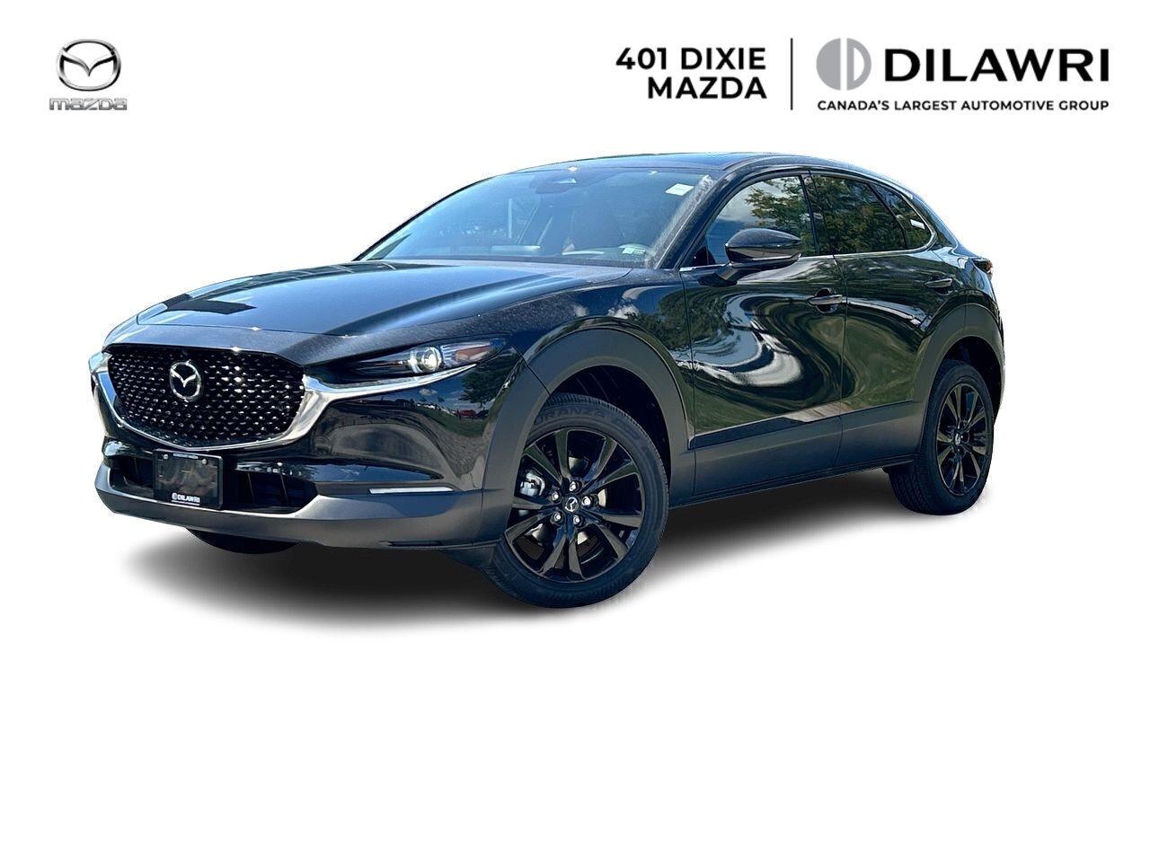 Versatile and ready for adventure. The CX-30 is designed for a joyous, effortless drive and the luxurious human-centric interior places the world within your reach. Tackle the road with standard feaures such as an eager Skyactiv-G 2.0L 4-cylinder engine, available i-Activ AWD (All-Wheel Drive), Skyactiv-Drive 6-Speed Automatic Transmission with Manual-Shift Mode and Drive Selection Switch, G-Vectoring Control Plus (GVC Plus), 16 Alloy Wheels, LED headlights and Daytime Running Lights, LED Rear Combination Tail Lights, Steering-Wheel Mounted Audio and Cruise Controls, Steering Wheel Mounted Bluetooth&reg; Controls, Push Button Start, Keyless Entry, Rearview Camera (Wide Angle), Adjustable Heated Front Seats, Air-Conditioning with Manual Climate Controls, Rear Heater Ducts, Rear Seat Centre Armrest with Cup Holders, 60/40-Split Folding Rear Seat, Navigation-ready (requires navigation SD card accessory), HMI Commander Switch, 8.8 Colour Touchscreen Display with Mazda Connect, Apple CarPlay&trade; and Android Auto&trade; smartphone compatibility.

Additional features such as an upgraded Skyactiv-G 2.5 with Cylinder Deactivation 4-cylinder engine, Paddle Shifters, 18 Alloy Wheels, Leather-trimmed Upholstery, i-ACTIVSENSE Safety Features, Power Glass Moonroof, Heated Steering Wheel, Advanced Keyless Entry (Proximity and Ignition), Bose&reg; Premium Audio Sound System with 12-Speakers, Navigation System, Drivers Seat Memory Position, SiriusXM&reg; Satellite Radio, HomeLink&reg; Wireless Control System available on select trim upgrades &ndash; just to name a few, contact us for a video walkaround on demand.

Contact us for availability of this specific vehicle unit prior to your visit! We can be reached by email, text, or even shop online at your convenience via Dilawri Anywhere!

Dilawri Group of Companies is Canadas largest automotive group with 76 franchised dealerships representing 35 automotive brands throughout Quebec, Ontario, Saskatchewan, Alberta, and British Columbia. Privately owned and operated by the Dilawri family since 1985, the company continues to expand its footprint in Canada, building on its history of excellence in the automotive industry. With more than 4,000 employees, Dilawri Group of Companies is proud to offer exceptional products and customer service in every dealership. Dilawri Group of Companies is not only a leader in the automotive industry but also a leader in the communities it serves. The Dilawri Foundation, established in 2002, has contributed millions of dollars throughout Canada supporting a variety of charitable causes.