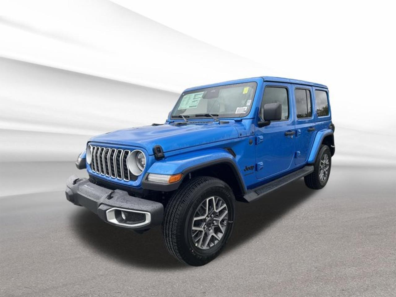 Experience adventure and capability with the brand new 2025 Jeep Wrangler Sahara, now available at Steele Halifax Chrysler Dodge Jeep Ram FIAT. This four-door SUV, finished in a bold blue exterior with a refined black interior, delivers legendary Jeep performance and versatility. Equipped with a 2.0-litre Intercooled Turbo Premium Unleaded I-4 engine and advanced four-wheel drive, the Wrangler Sahara is ready for Halifaxs city streets and rugged trails alike.ADVANCED SAFETY FEATURESFour-wheel anti-lock disc brakes for confident stopping powerAdvanced multistage front airbags for enhanced protectionElectronic stability control for improved vehicle handlingTire pressure monitoring system for added safetyPERFORMANCE AND EFFICIENCY2.0-litre turbocharged I-4 delivers responsive powerAutomatic transmission for smooth, effortless drivingFour-wheel drive system for all-terrain capabilityGas engine balances efficiency and performanceCOMFORT AND CONVENIENCESpacious four-door layout for easy accessDual-zone automatic climate control for personalized comfortPower windows and door locks for convenienceAmple legroom for both front and rear passengersTECHNOLOGY AND CONNECTIVITYTouchscreen infotainment system for intuitive controlBluetooth connectivity for hands-free communicationMultiple USB ports for device chargingIntegrated voice command for safer operationCARGO SPACEFlexible rear cargo area for gear and luggageSplit-folding rear seats for expanded spaceWide-opening rear door for easy loadingPractical storage compartments throughout the cabinWHAT OTHER OWNERS LIKEExceptional off-road capability in all conditionsComfortable ride for daily driving and long tripsUser-friendly technology and infotainment featuresIconic Jeep styling and presence on the roadThis 2025 Jeep Wrangler Saharas VIN is: 1C4PJXEN7SW660111.