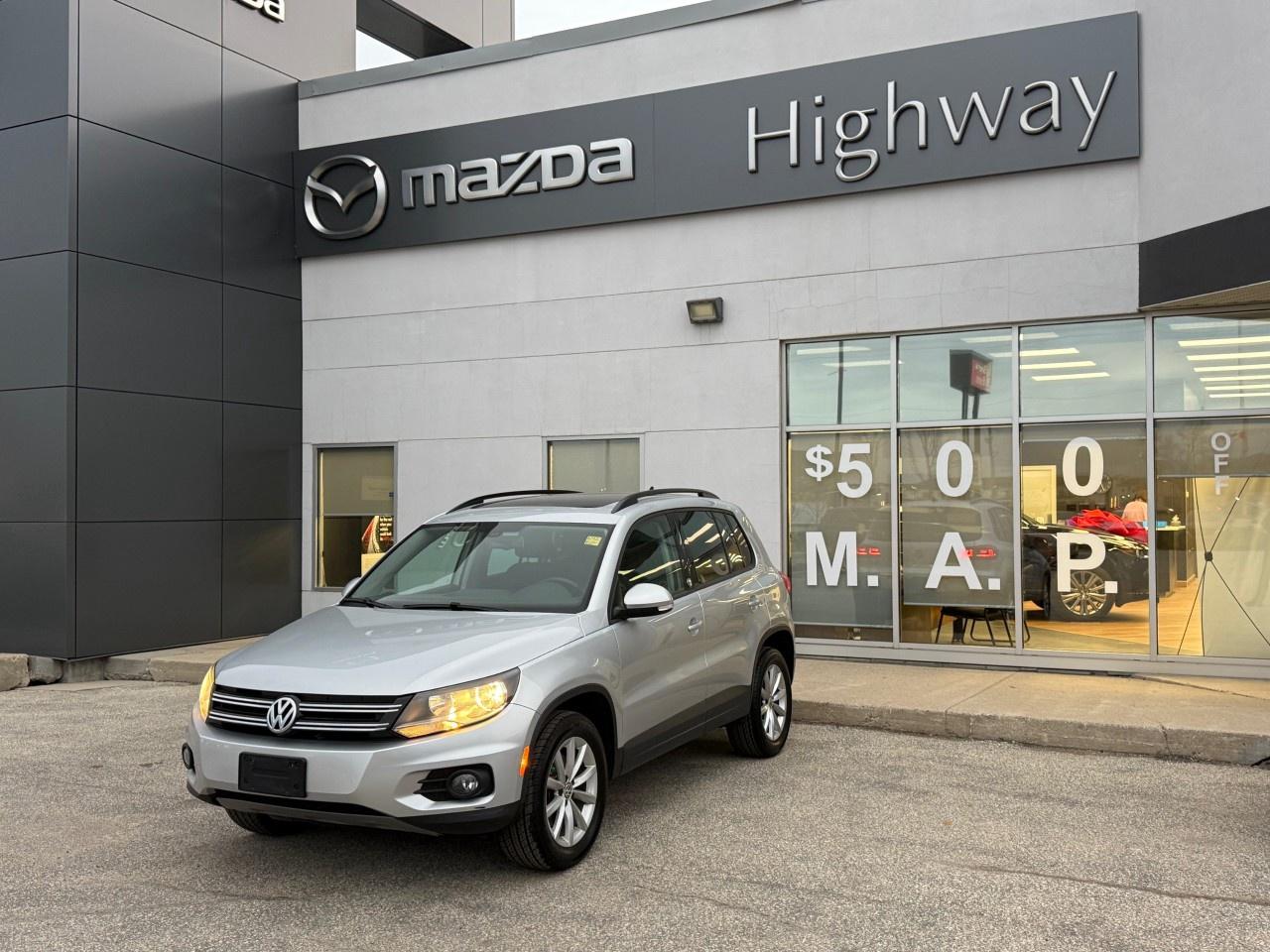 This 2017 Volkswagen Tiguan Wolfsburg Edition delivers a refined European driving experience with its punchy 200-hp turbocharged engine and confidence-inspiring 4Motion AWD system. This special edition comes impressively equipped with premium features including a panoramic sunroof, 17-inch "Novara" alloy wheels, and a modern 6.3-inch touchscreen featuring Apple CarPlay and Android Auto integration.Come by Highway Mazda today!