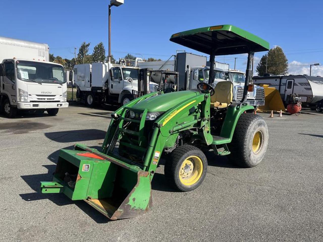 2008 JOHN DEERE 3320 300X LOADER E HYDRO TRACTOR, DIESEL 4x4 GREEN, VIN LV3320H421131, 2,033.00 HOURS (NOT VERIFIED), COMES WITH  REGISTRATION, RUBBER TIRES, FORMER MUNICIPALITY ASSET  1 SEATER, GALAXY TURF SPECIAL 41/18LLX16.1 REAR, 25/10.50LLX15 FRONT, 61 FRONT BUCKET WITH COUNTER WEIGHT BOX, MINOR SCRATCHES AND DENTS, TRAILER HITCH BAR  $23,750.00 plus $375 processing fee, $24,125.00 total payment obligation before taxes. Sale price until April 18, 2026, 3:00 PM PDT. Listing report, warranty, contract commitment cancellation fee, financing available on approved credit (some limitations and exceptions may apply). All above specifications and information is considered to be accurate but is not guaranteed and no opinion or advice is given as to whether this item should be purchased. We do not allow test drives due to theft, fraud, acts of vandalism and undetectable impaired driving. Instead we provide the following benefits: Complimentary Warranty (with options to extend), Limited Money Back Satisfaction Guarantee on Fully Completed Contracts, Contract Commitment Cancellation, and an Open-Ended Sell-Back Option. Ask seller for details or call 604-522-REPO(7376) to confirm listing availability.