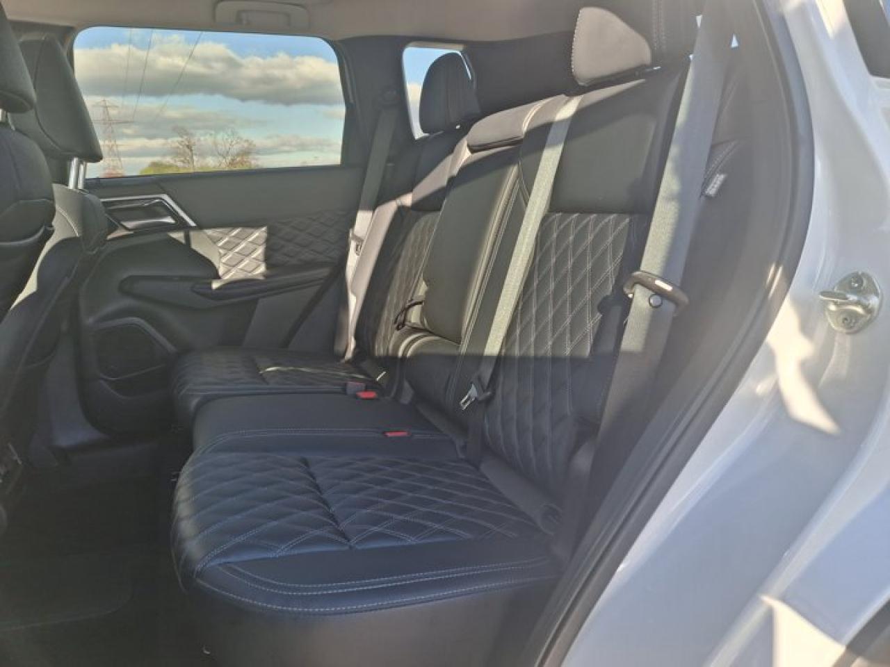 2024 Mitsubishi Outlander Plug-In Hybrid SEL AWC | 7 Pass | Leather | Pano Roof | Nav | 360 Camera | Adaptive Cruise | Heated Wheel + Seats | Photo