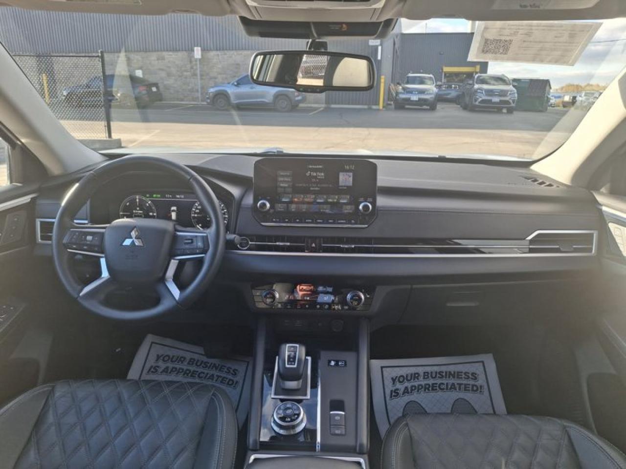 2024 Mitsubishi Outlander Plug-In Hybrid SEL AWC | 7 Pass | Leather | Pano Roof | Nav | 360 Camera | Adaptive Cruise | Heated Wheel + Seats | Photo