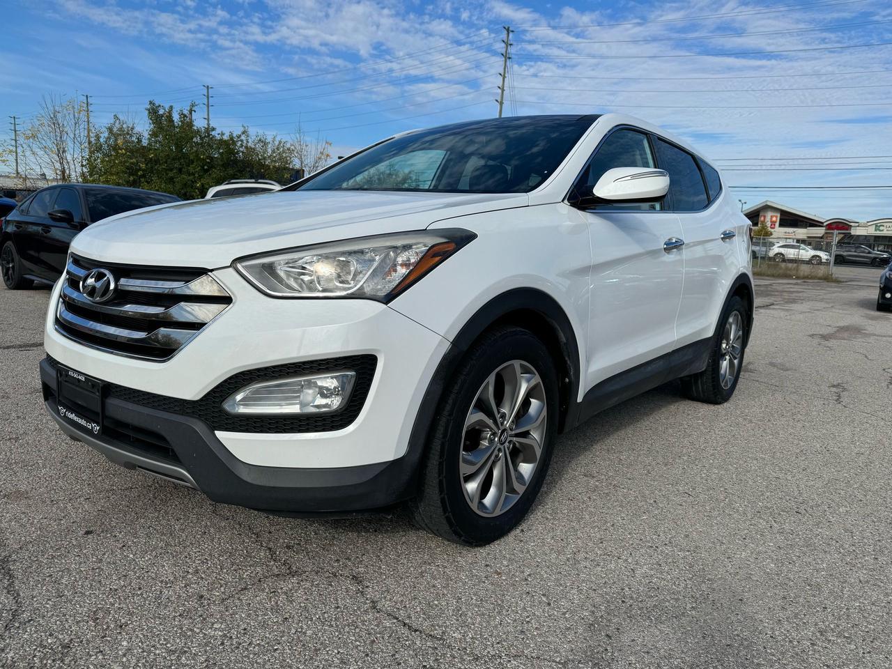 <div>2013 Hyundai Santa Fe Sport Limited AWD comes in excellent condition,,,,,ONE OWNER ONLY,,,,LOW KILOMETRES,,,CLEAN CARFAX REPORT,,,,runs & drives like brand new....Fully Loaded, Equipped with Backup Camera, Navigation System, Panoramic Sunroof, Leather interior, Power Steering Wheel, Power mirrors, heated mirrors, Power Seats, heated seats, keyless entry, push start, Power doors lock, Power tailgate, Bluetooth, Cruise Control and much more....Fully certified included in the price, HST & Licensing extra....This vehicle has been serviced in 2014, 2015, 2016, 2017 & up to very recent in Hyundai Store....Service records available upon request.........Please contact us @ 4 1 6 5 4 3 4 4 3 8 for more details....At Rideflex Auto we are serving our clients across G.T.A, Toronto, Vaughan, Richmond Hill, Newmarket, Bradford, Markham, Mississauga, Scarborough, Pickering, Ajax, Oakville, Hamilton, Brampton, Waterloo, Burlington, Aurora, Milton, Whitby, Kitchener London, Brantford, Barrie, Milton.......</div><div>Buy with confidence from Rideflex Auto... &nbsp; &nbsp;&nbsp;</div><div><br></div><div><br></div><div><br></div><div><br></div>