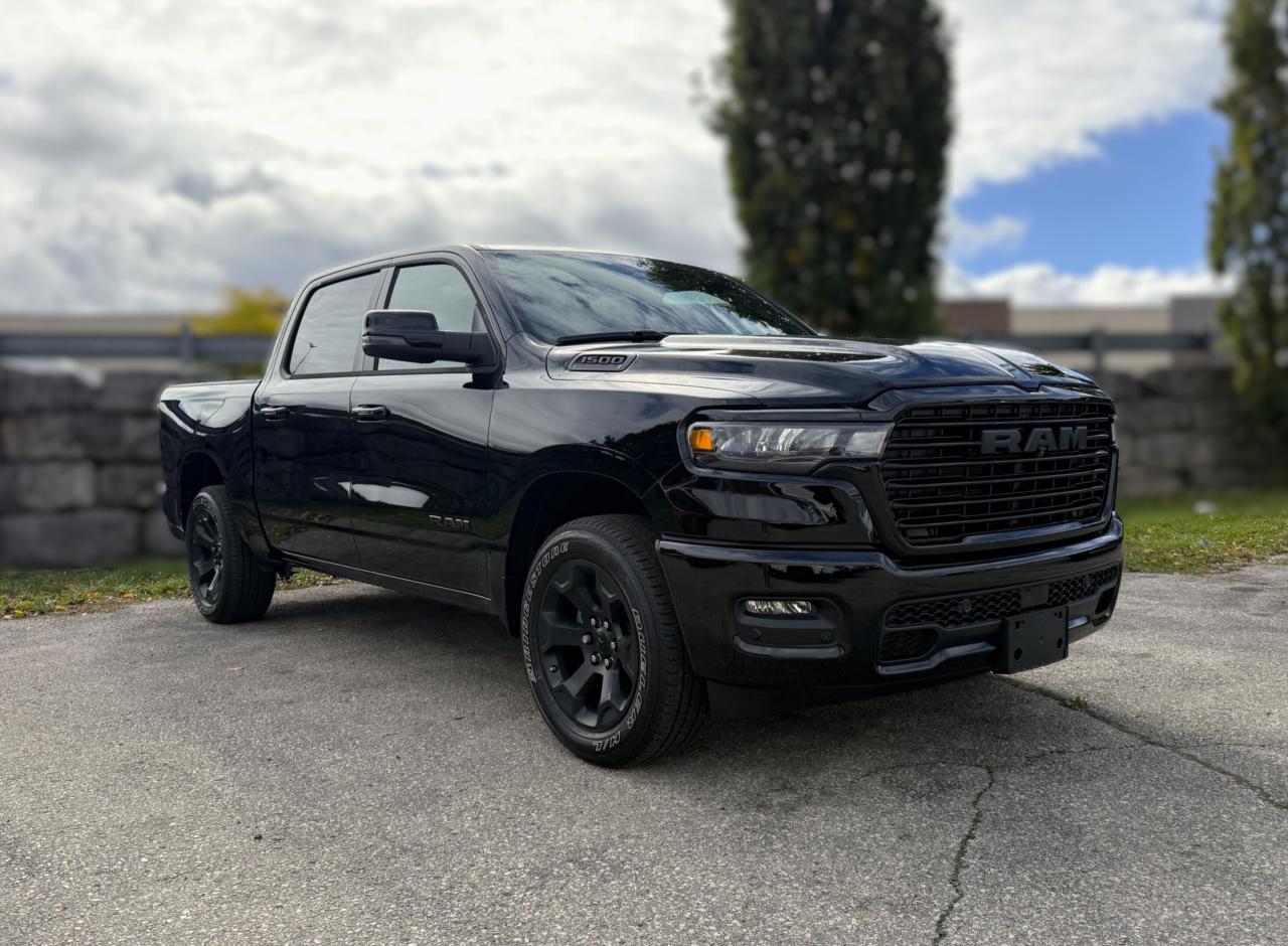 2026 RAM 1500 Sport 4x4 Crew Cab 5'7  Box Photo2