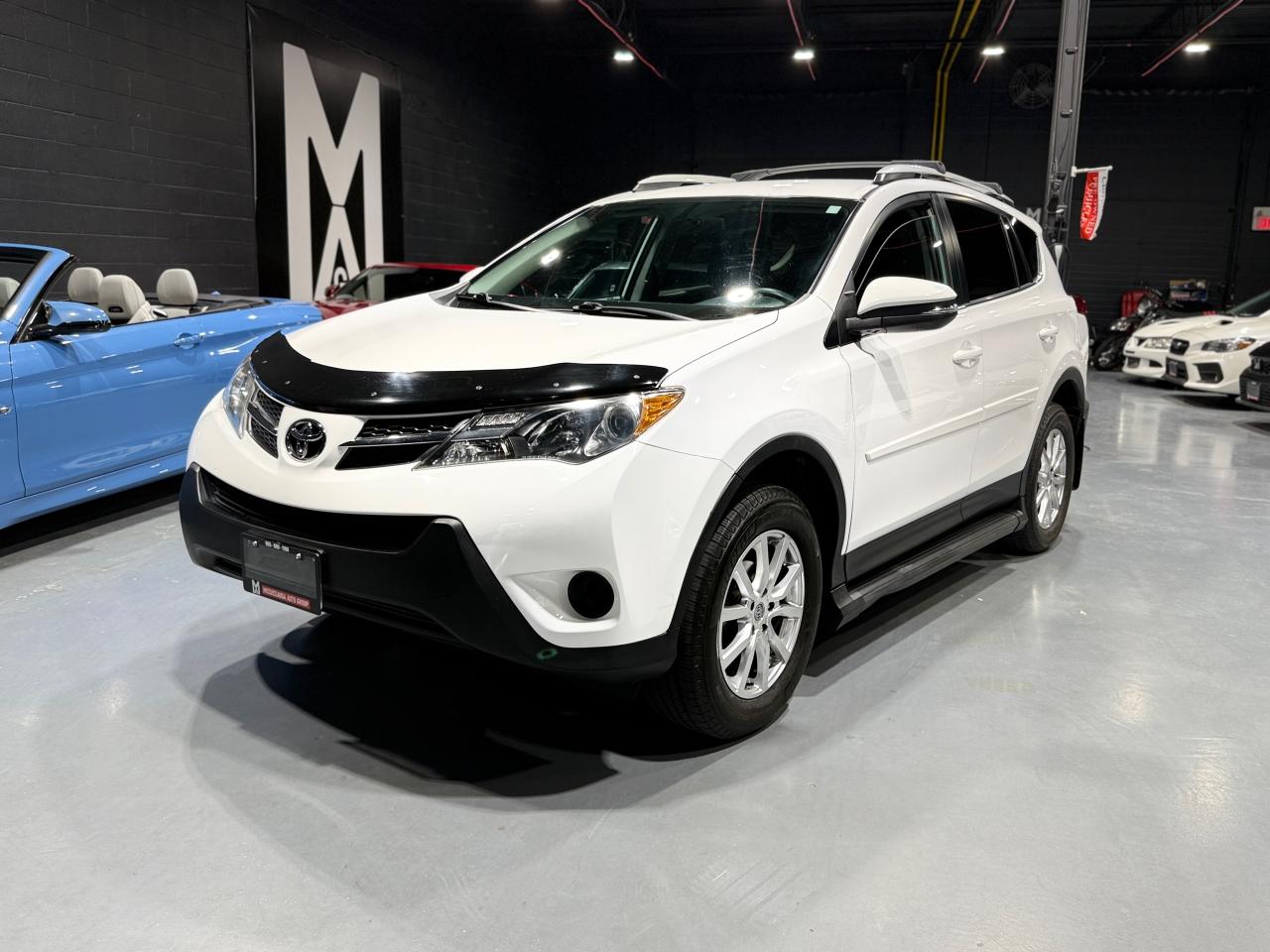 2014 Toyota RAV4 AWD 4dr LE Photo0