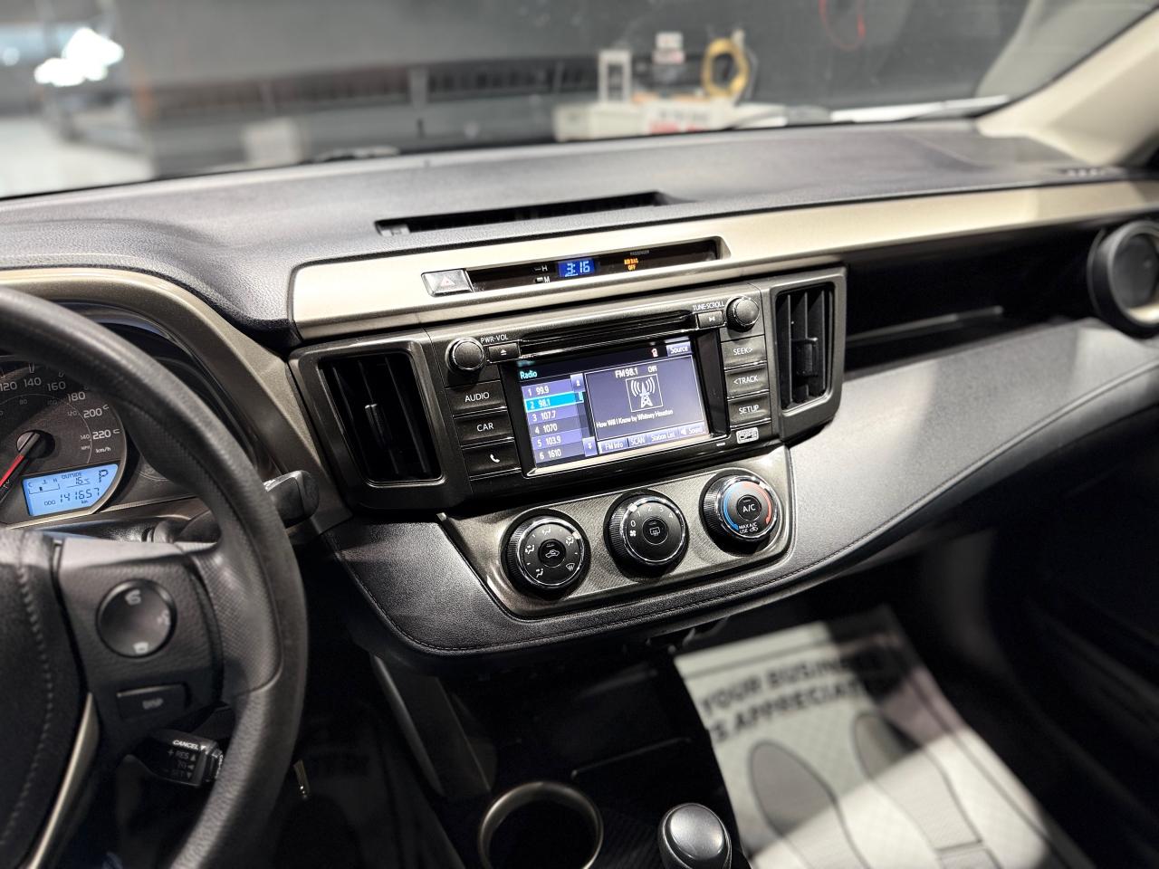 2014 Toyota RAV4 AWD 4dr LE Photo