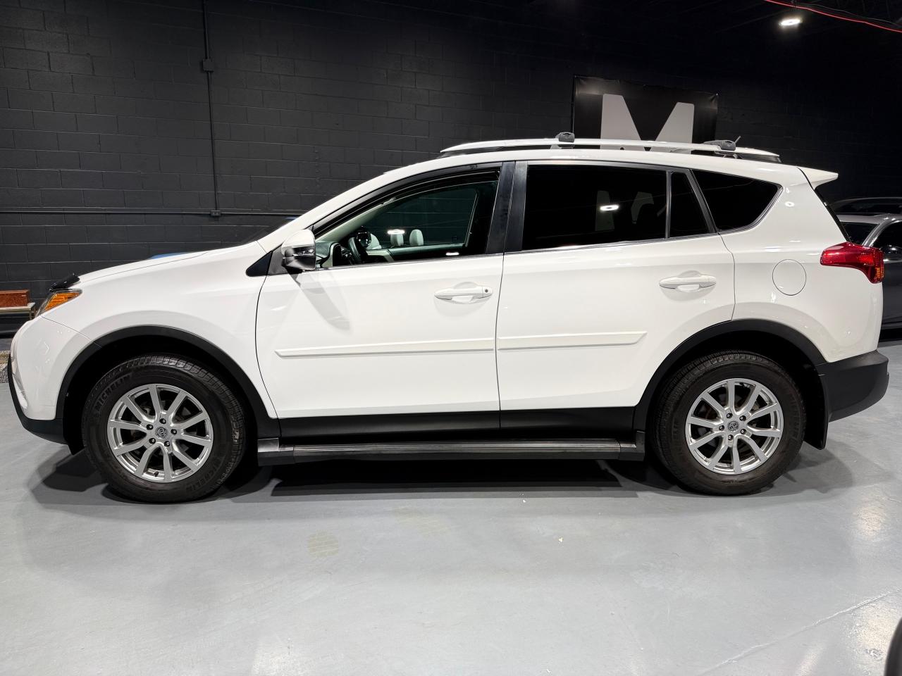 2014 Toyota RAV4 AWD 4dr LE Photo