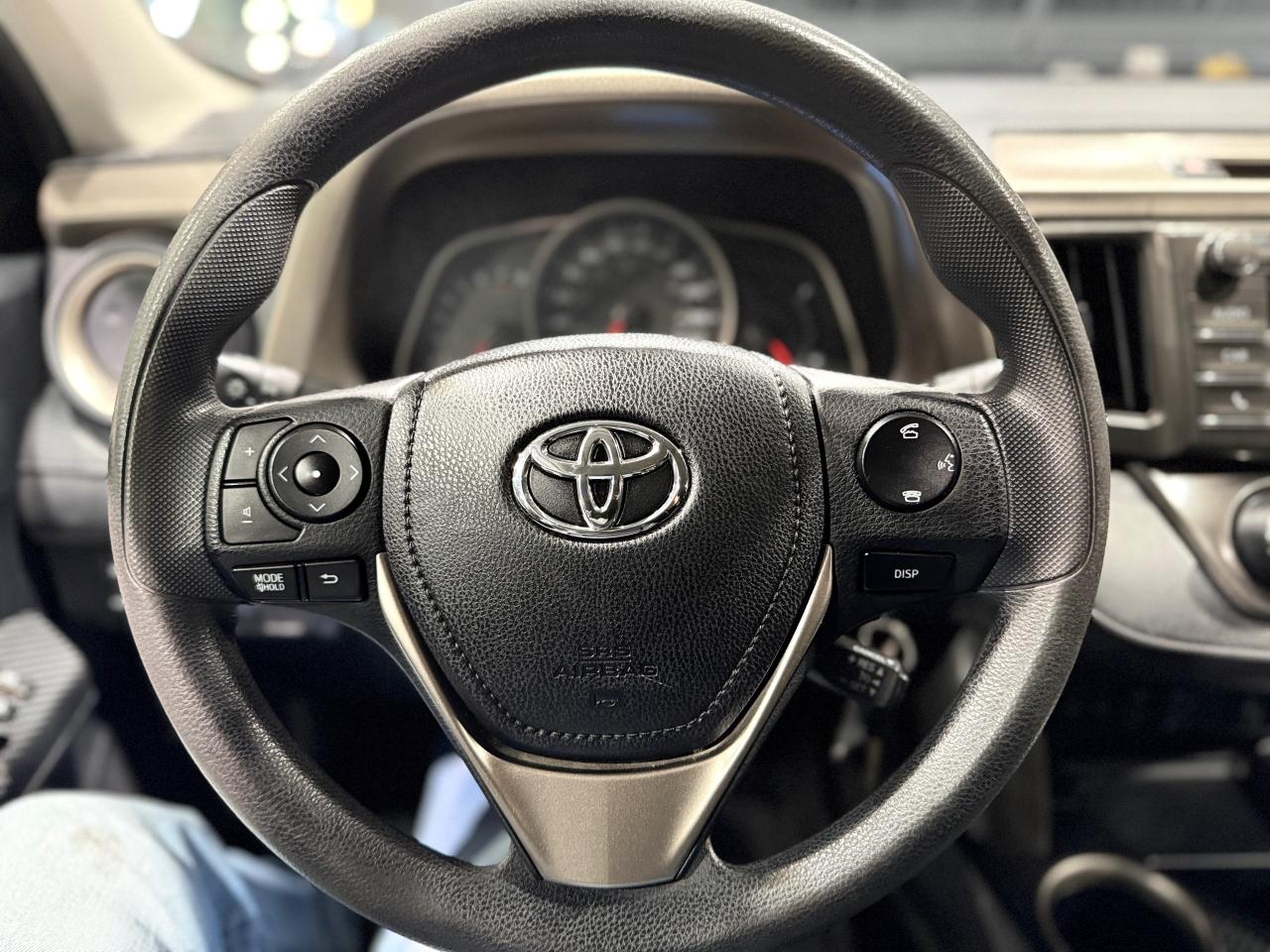 2014 Toyota RAV4 AWD 4dr LE Photo