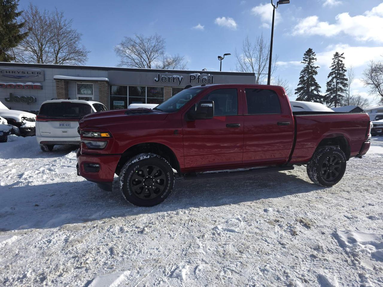 2026 RAM 2500 TRADESMAN CREW CAB 4X4
Exterior Color: Molten Red Pearl, Interior Color: Black interior / Black seats, Interior: Cloth front 40/20/40 split bench seat, Engine: 6.7L Cummins I6 HO turbocharged diesel engine, Transmission: 8speed TorqueFlite automatic transmission, Electronic shiftonthefly transfer case, FullSpeed Forward Collision Warning Plus
Pedestrian/Cyclist emergency braking
Adaptive Cruise Control with Stop
Selectable tire fill alert
LED high/low reflector headlamps
LED fog lamps
Uconnect 5 with 8.4in display
Google Android Auto
Apple CarPlay capable
SiriusXM satellite radio
Handsfree phone and audio
4G LTE WiFi hot spot
Pushbutton start
Remote keyless entry
ParkView Rear BackUp Camera
4wheel antilock disc brakes
Brake Assist
Ready Alert Braking
Hill Start Assist
Advanced multistage front air bags
Supplemental side air bags, Supplemental front seatmounted side air bags, Supplemental side curtain front & rear air bags,
Electronic Stability Control, Traction Control, Trailer Light Check
Sentry Key Theft Deterrent System, Automatic headlamps,
Class V hitch receiver, 4pin wiring harness, 7pin wiring harness, Electronic Roll Mitigation, Trailer Sway Control,
Locking tailgate, Engine block heater, Air conditioning,
3.5inch fullcolour incluster display, Media hub w/ 2 USB ports and auxiliary input jack, Tilt steering column, Molten Red Pearl 
Customer Preferred Package 24C, 3.42 axle ratio, Power heated, folding telescoping exterior mirrors, Power adjust mirrors, Power telescoping mirrors, Automatic power folding mirrors, Forward and reverse utility lights, Sport performance hood, Cloth front 40/20/40 split bench seat, Exterior mirrors with supplemental turn signals, Exterior mirrors with courtesy lamps,
Power convex auxiliary exterior mirrors, Mirror running lights,
Black Mopar tubular side steps, Heated exterior mirrors, LT285/60R20E OWL On/OffRoad tires, 20x8inch Black aluminum wheels, ParkSense Front and Rear Park Assist System, Bed Utility Group, LED bed lighting, Mopar deployable bed step, Mopar sprayin bedliner, Tradesman Level 1 Equipment, Emergency Vehicle Alert System(EVAS),
Trailer Tow Pages, Convenience Group, Antispin differential rear axle, Rear power sliding window, A/C with dualzone automatic temperature control, OffRoad Information Pages
115volt auxiliary power outlet-front, GPS navigation, Alexa BuiltIn, SiriusXM with 360L ondemand content, Connected travel & traffic services, Uconnect 5 NAV with 12in display,
115volt auxiliary power outlet  exterior, Mopar front & rear allweather floor mats, 8speed TorqueFlite automatic transmission, 
6.7L Cummins I6 HO turbocharged diesel engine, 3.42 axle ratio, GVWR: 4490 kg (9900 lb).