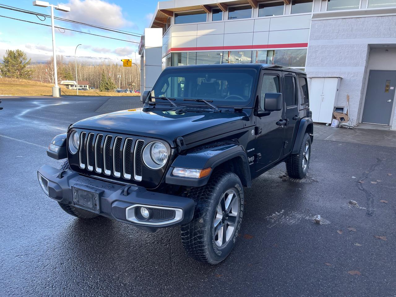 <p>Looking for adventure? Smithers Toyota has a rugged and capable 2023 Jeep Wrangler Sahara ready to take you there! This black beauty is a four-door SUV, perfect for both city commutes and weekend getaways. With only 96105KM on the odometer, this Wrangler is ready for many more adventures. Its automatic transmission and 4-wheel drive system make it a breeze to handle any terrain, while its comfortable interior and impressive features ensure a smooth and enjoyable ride for you and your passengers.</p><p>&nbsp;</p><p>This Wrangler Sahara is packed with features designed for both convenience and off-road capability. From its durable construction to its advanced technology, this Jeep is built to impress. Whether youre navigating city streets or exploring the great outdoors, this Wrangler offers the versatility and performance you need.</p><p>&nbsp;</p><p>Here are five features that make this 2023 Jeep Wrangler Sahara stand out:</p><p><br><br></p><ul><ul><li><strong>Selec-Speed Control:</strong> Conquer challenging terrains with ease.</li></ul></ul><p>&nbsp;</p><ul><ul><li><strong>SiriusXM Guardian Tracker System:</strong> Stay connected and secure.</li></ul></ul><p>&nbsp;</p><ul><ul><li><strong>Mobile Hotspot Internet Access:</strong> Stay connected on the go.</li></ul></ul><p>&nbsp;</p><ul><ul><li><strong>Parkview Back-Up Camera:</strong> Makes parking and maneuvering a breeze.</li></ul></ul><p>&nbsp;</p><ul><ul><li><strong>Freedom Panel Storage Bag:</strong> Enjoy the open air with ease.</li></ul></ul><p><br><br></p><p><strong><em>Powered by AutoIntelligence&trade;</em></strong><br>Vehicle information has been generated using artificial intelligence and is provided for informational purposes only. While efforts are made to ensure accuracy, please confirm all details directly with the dealer.</p><p>&nbsp;</p>