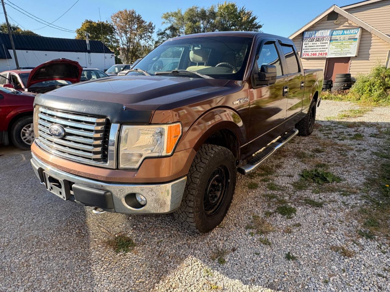 2011 Ford F-150 4WD SUPERCREW 145" XLT Photo