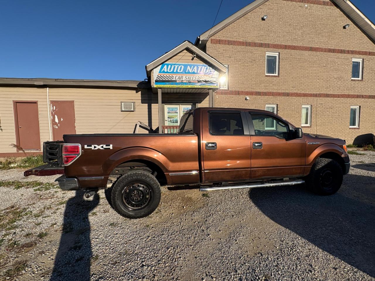 2011 Ford F-150 4WD SUPERCREW 145" XLT Photo