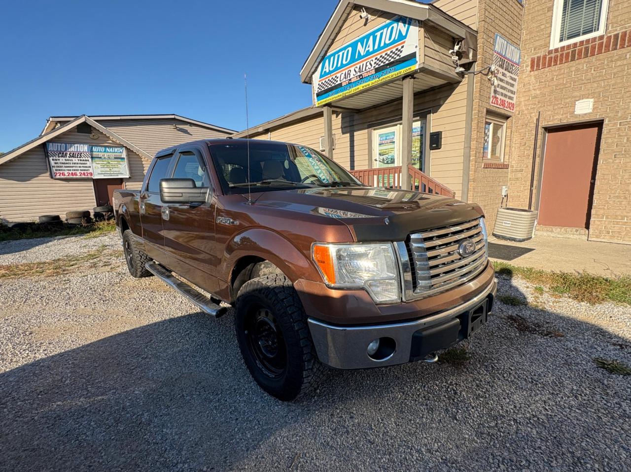 2011 Ford F-150 4WD SUPERCREW 145" XLT Photo