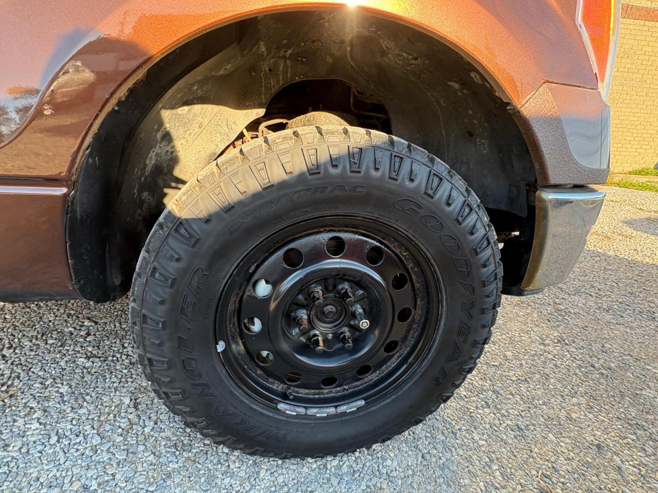 2011 Ford F-150 4WD SUPERCREW 145" XLT Photo